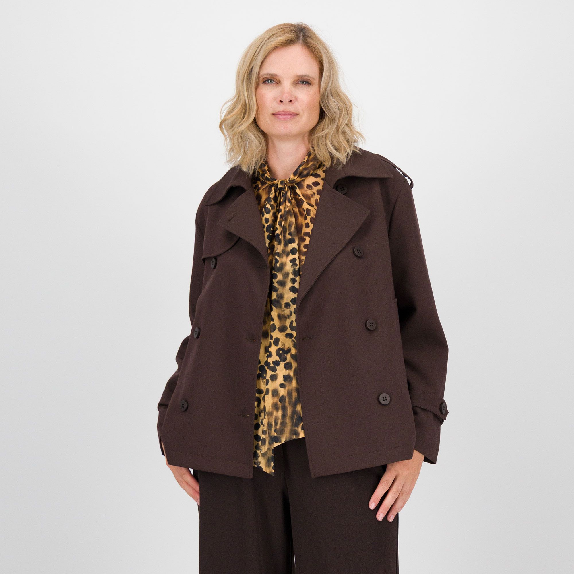 Caterina Lancini
Trench corto
a maniche lunghe