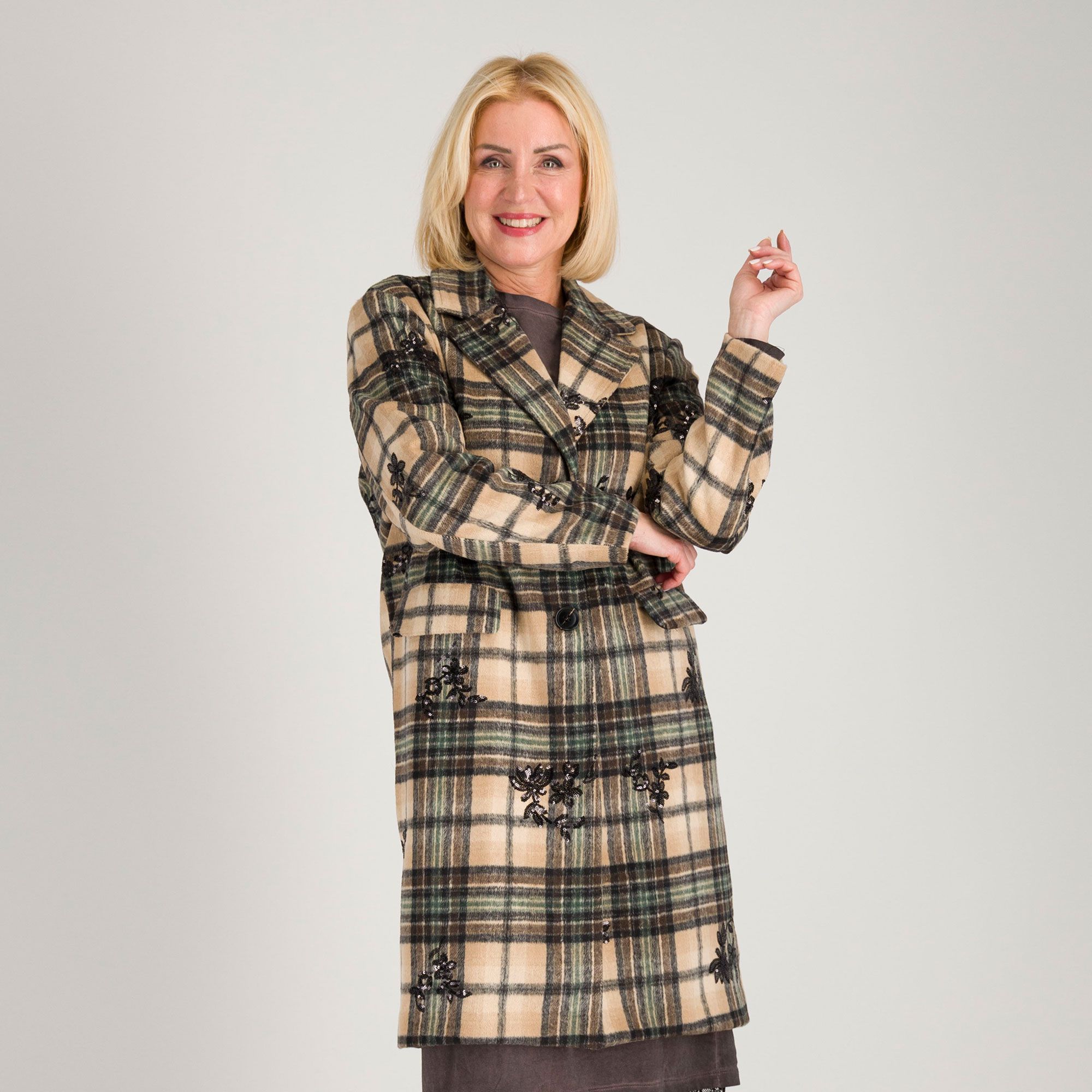 Enjoy
Cappotto a quadri
con paillettes