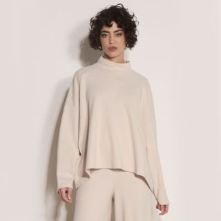Apricot
Maglia over in jersey
a nido d'ape
con spalla scesa