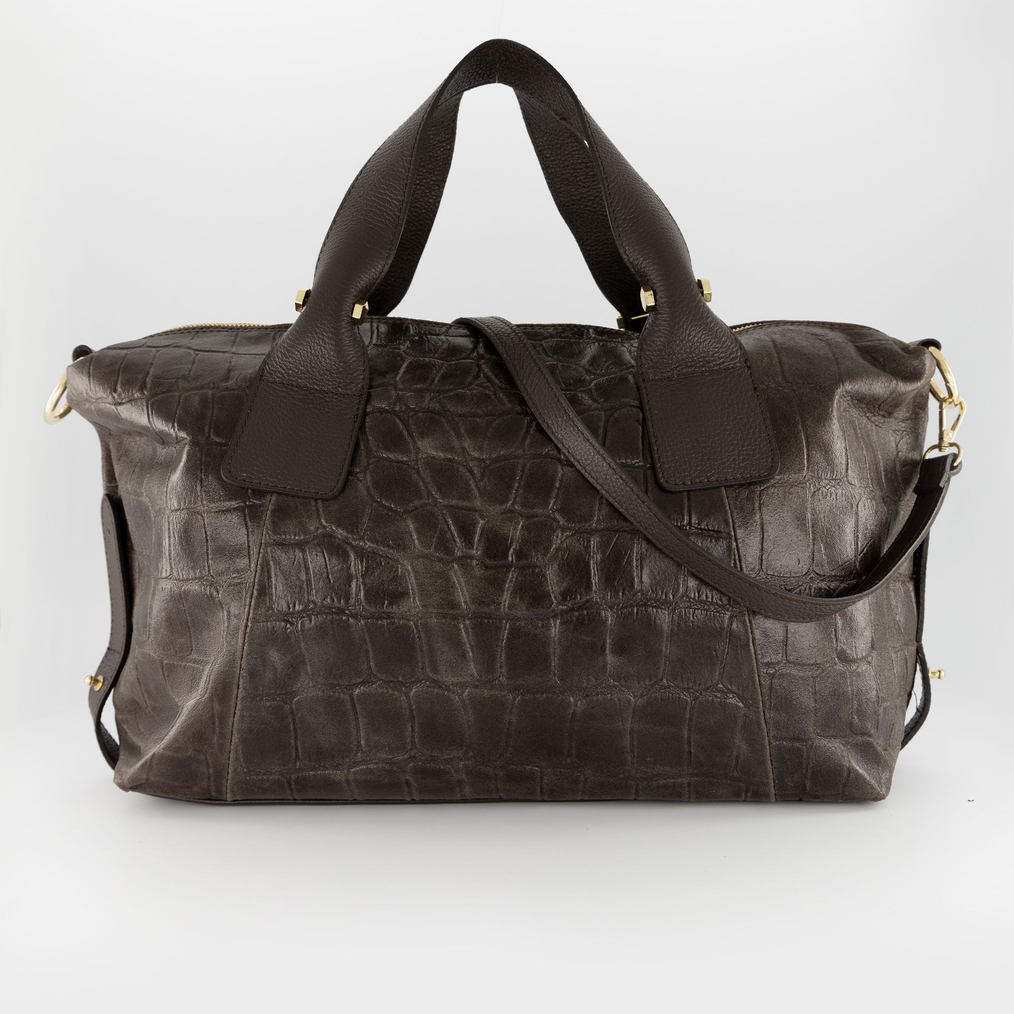 Le Corone Bags
Borsa a mano
Pearcing in pelle
con tracolla