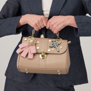Stefano Ghilardi
Borsa a mano in pelle
con strass
e tracolla regolabile