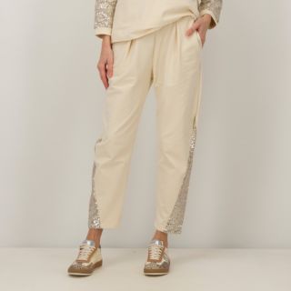 L'Una
Pantaloni in felpa
con pailettes
e elastico in vita