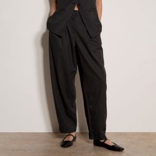 Apricot
Pantaloni ampi
con elastico