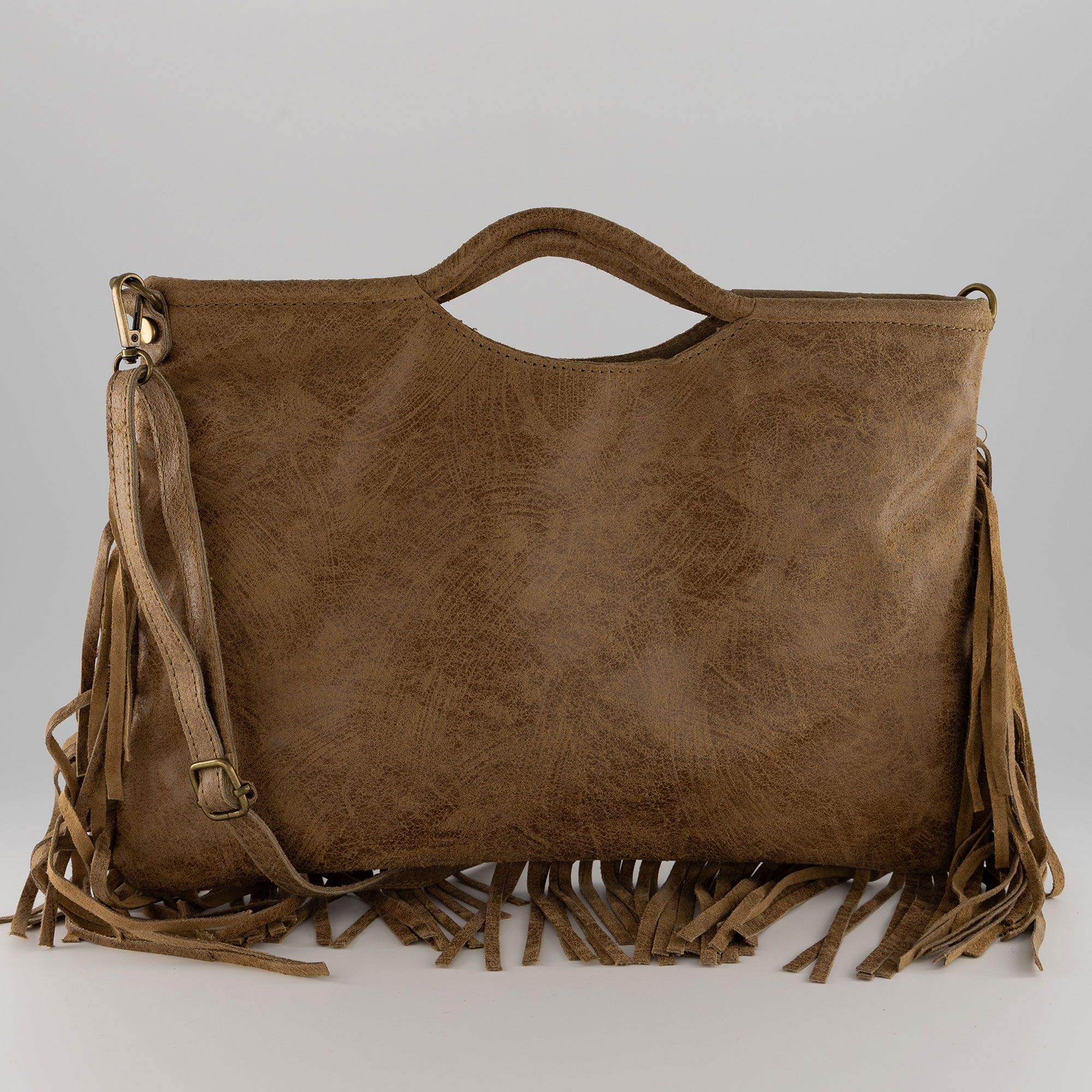 Le Corone Bags
Borsa a mano
Clint Midi in pelle
con frange