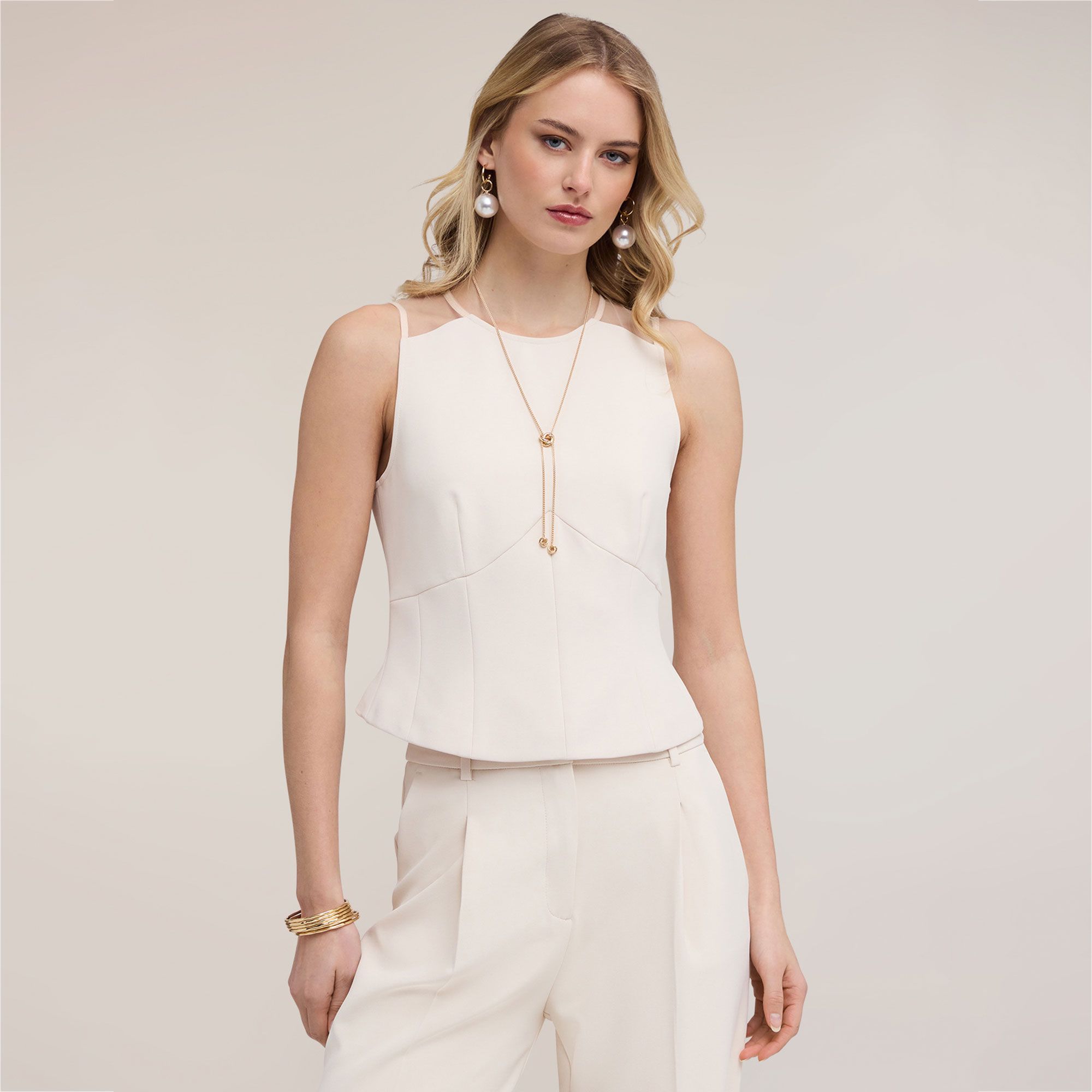 Motivi
Top smanicato