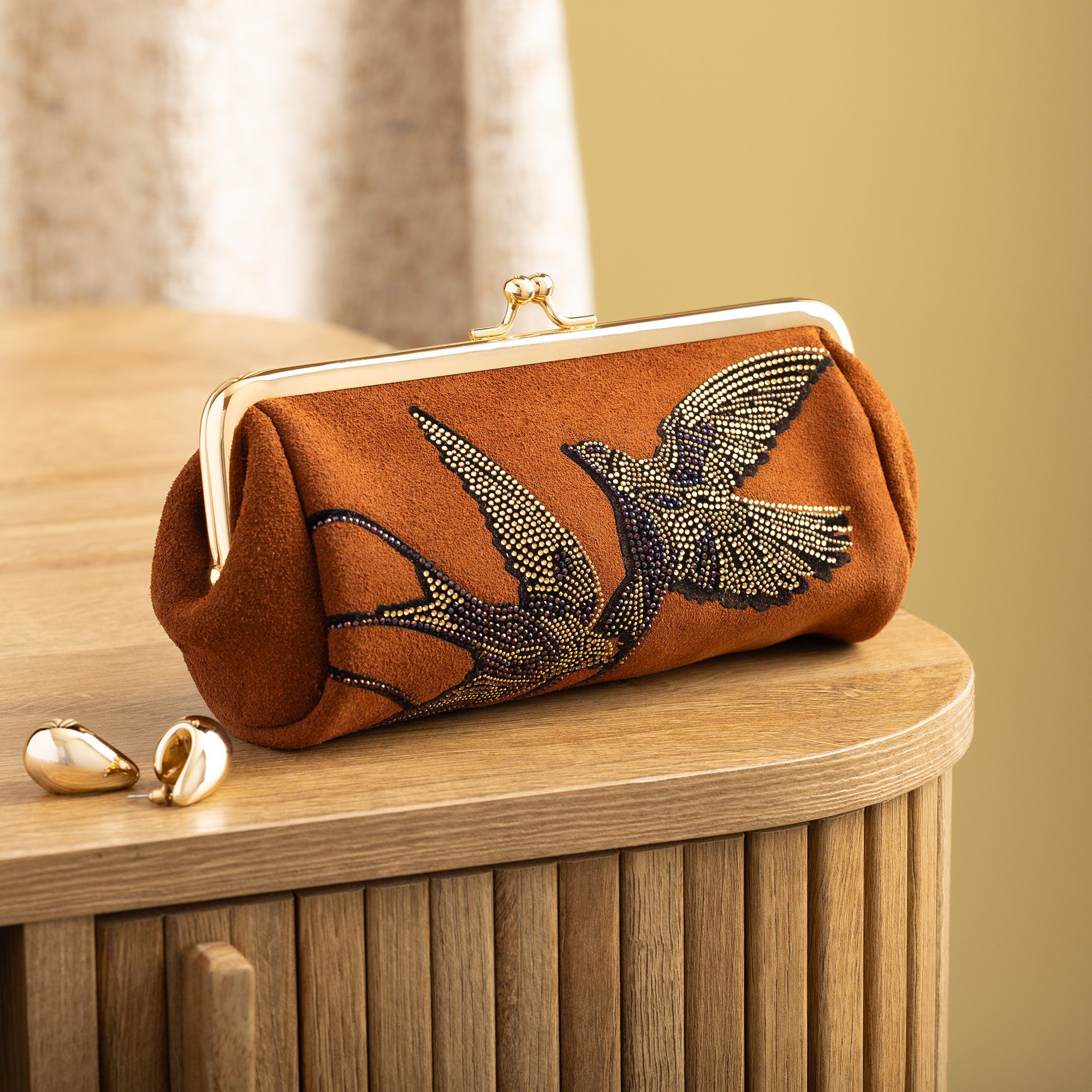 Stefano Ghilardi
Portamonete in pelle
scamosciata
con ricamo