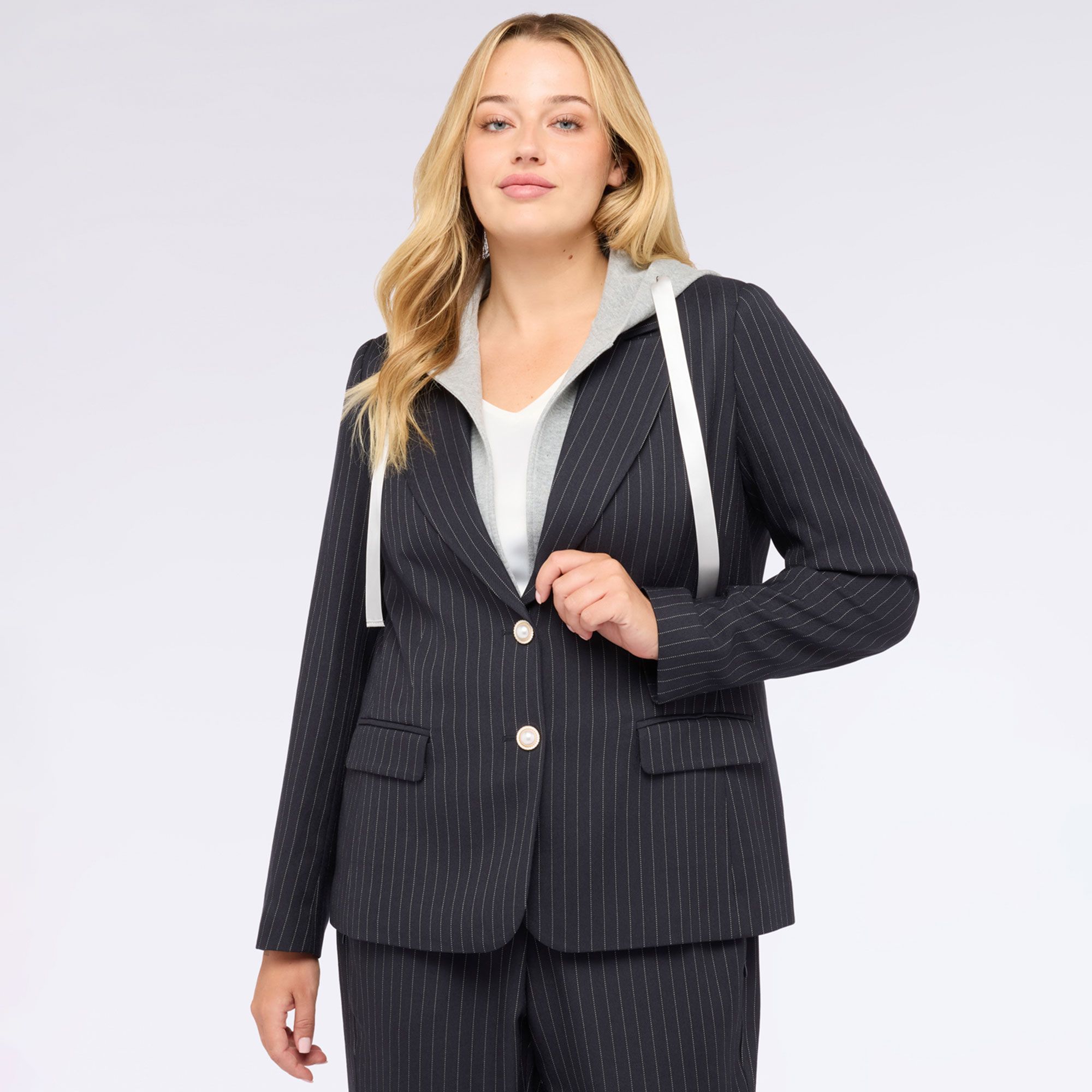 Fiorella Rubino
Giacca blazer
gessata con felpa
removibile