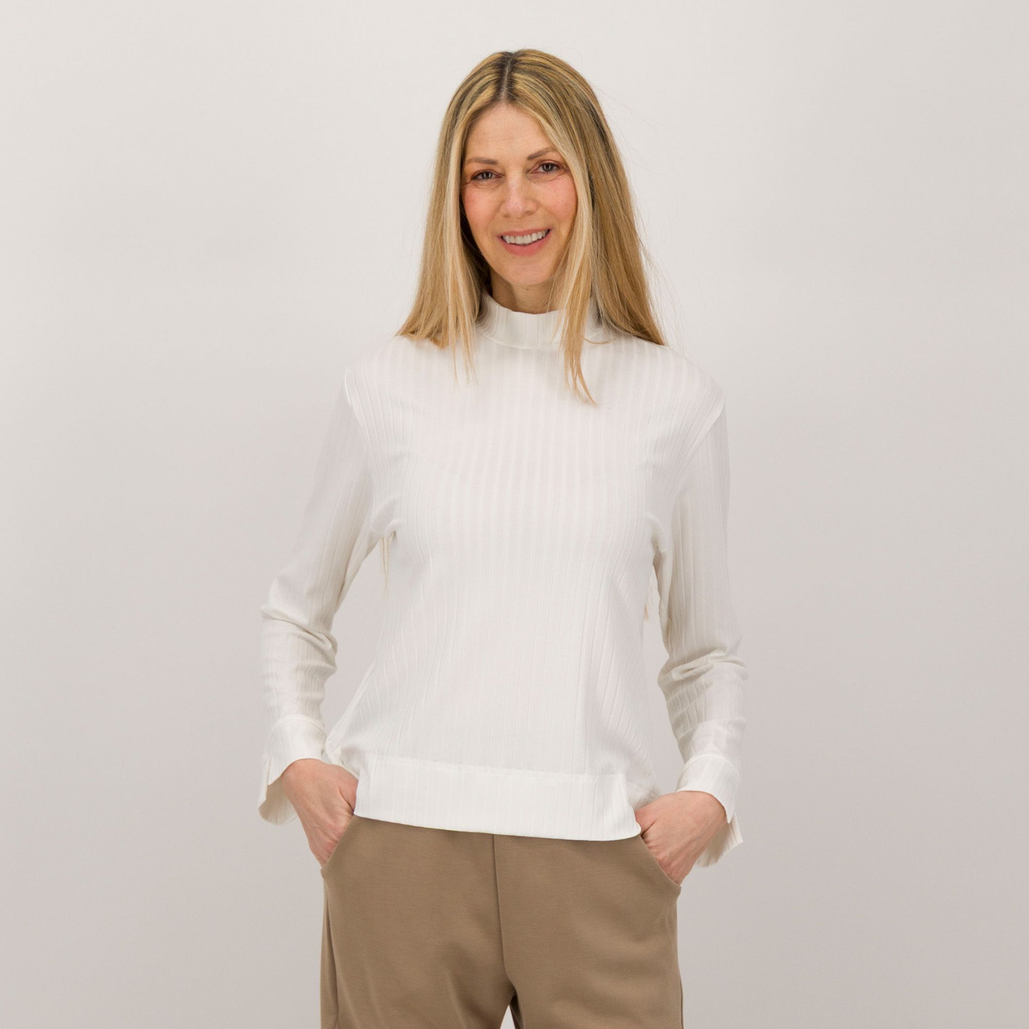 M’ama
Maglia elasticizzata
in costa larga a
maniche lunghe