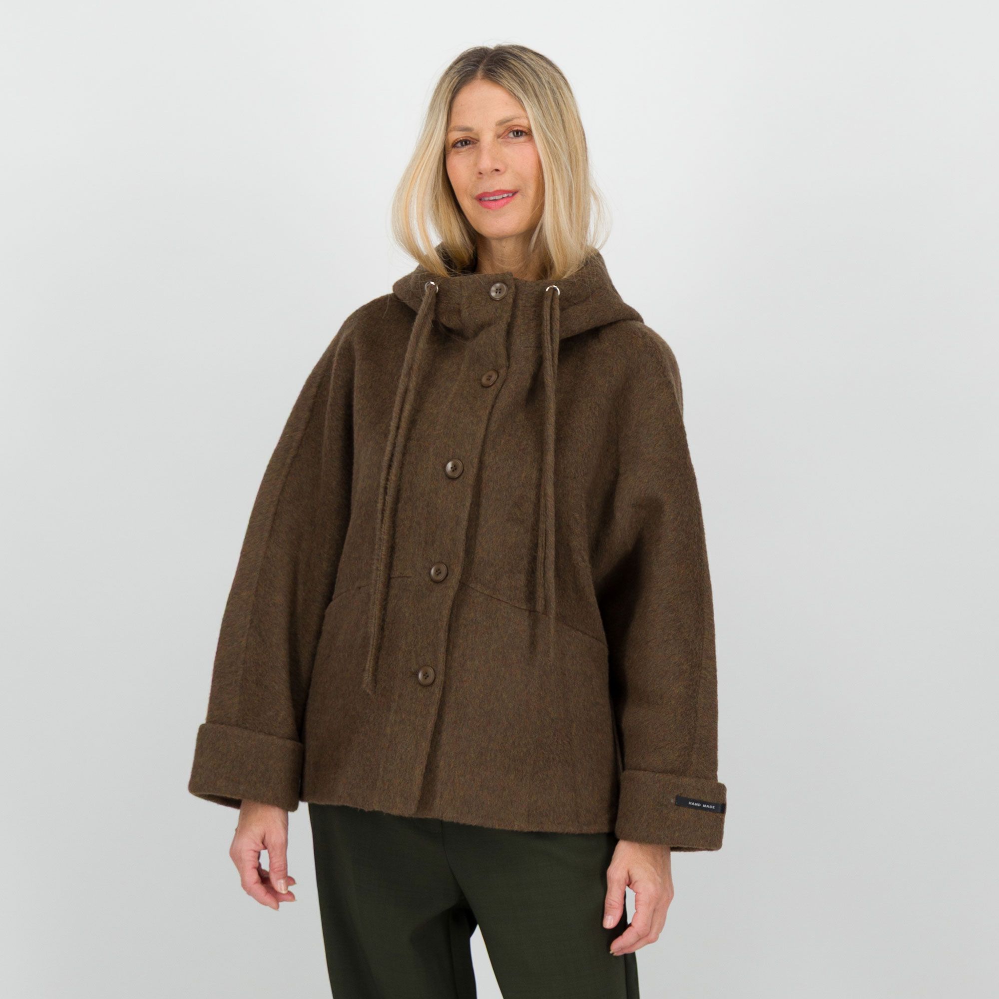 Risskio
Parka in panno
misto lana con tasche
a filetto