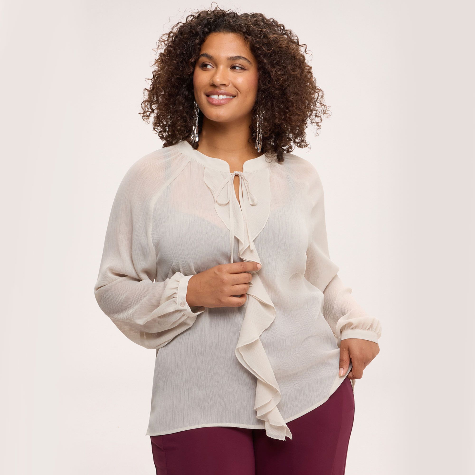 Fiorella Rubino
Blusa in creponne
con scollo a giro
a maniche lunghe