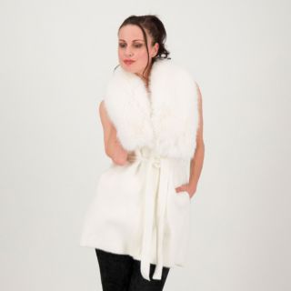 Angela Mele Milano
Gilet in maglia
con collo
in pelo sintetico
