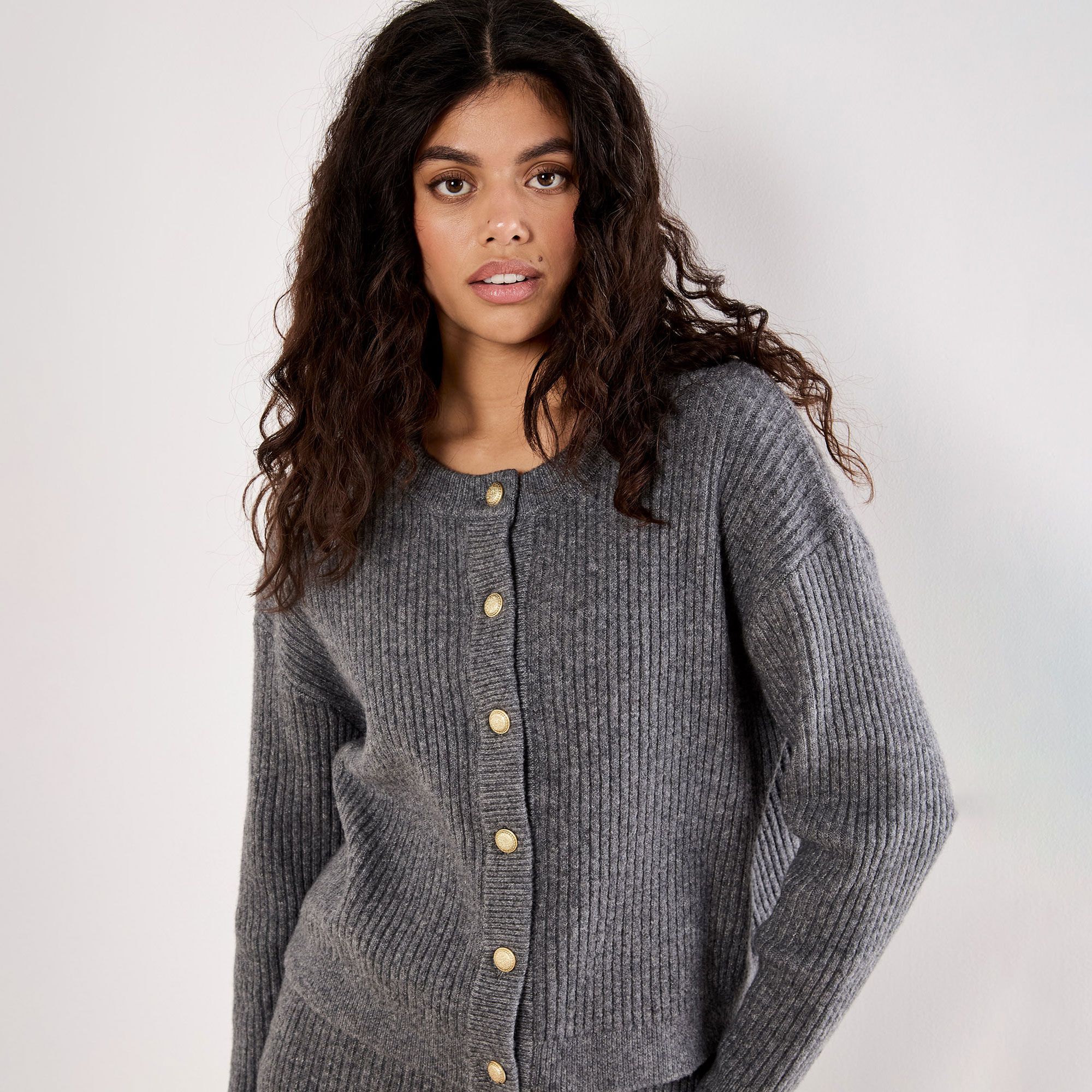 Apricot
Cardigan
in maglia
di misto cotone