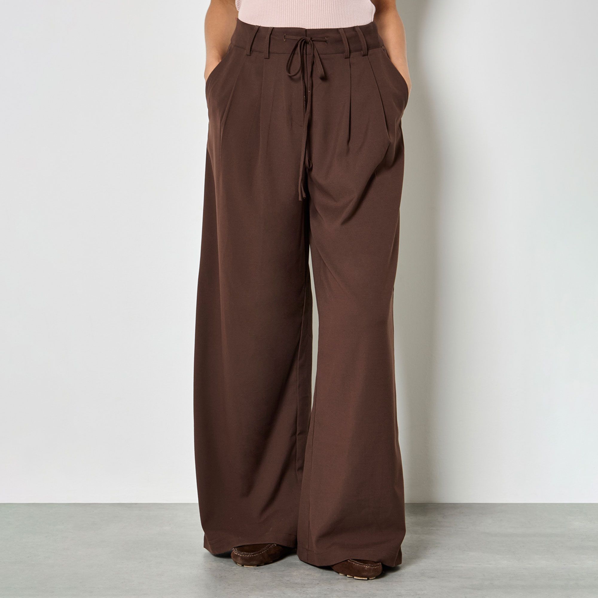 Apricot
Pantaloni a
gamba larga
con tasche