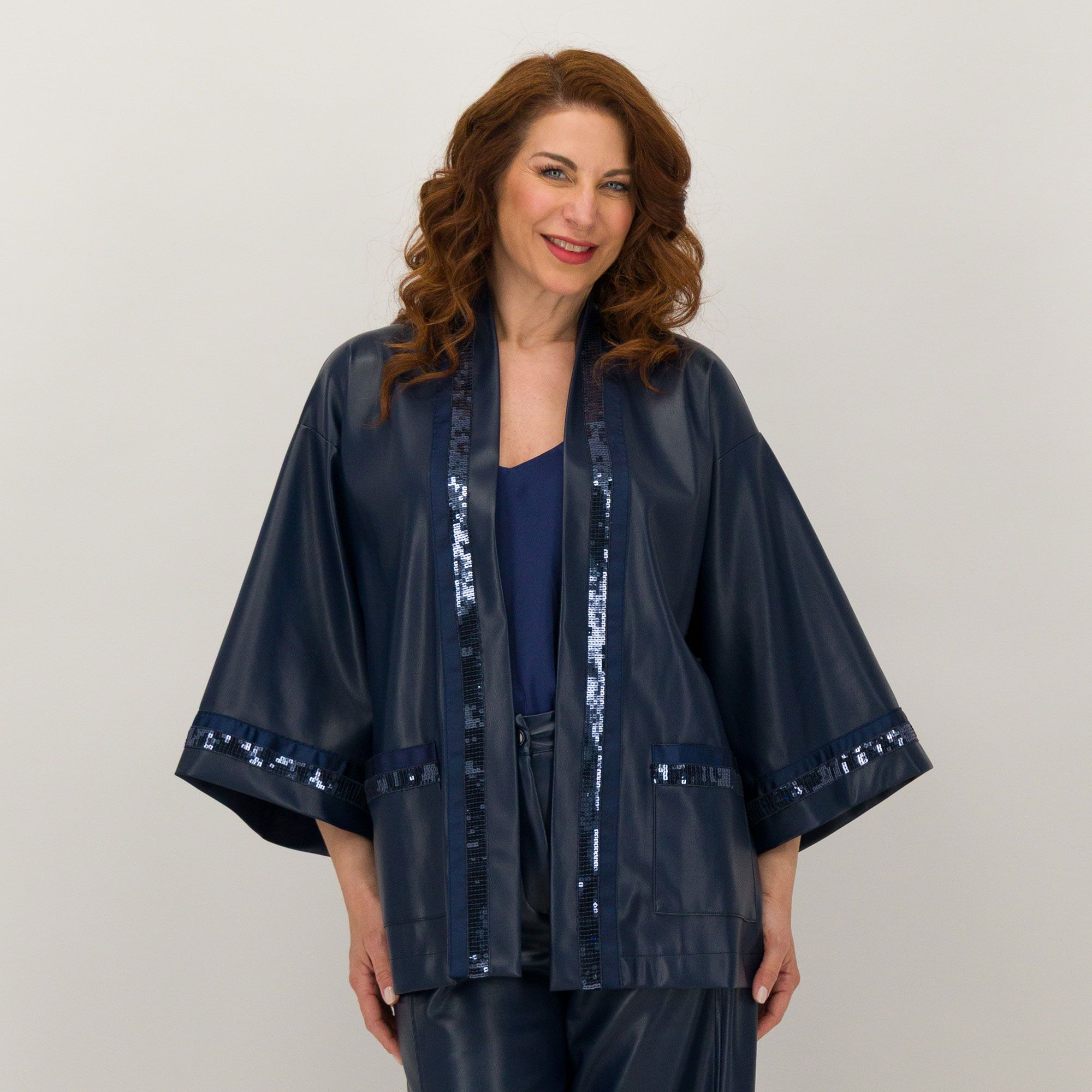 Caterina Lancini
Kimono in tessuto
spalmato con tasche