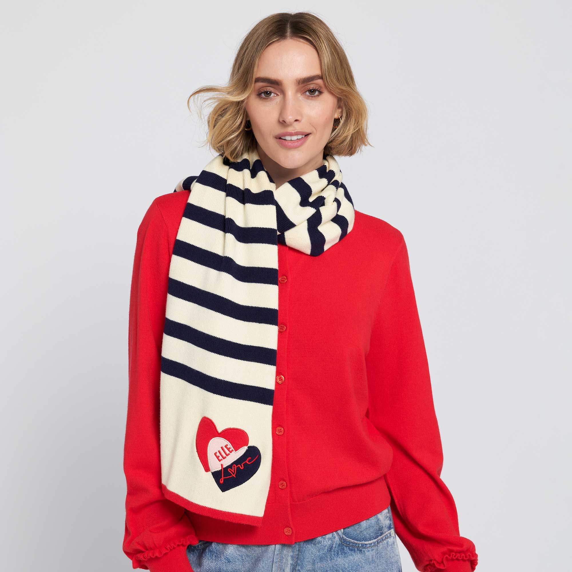 ELLE
Sciarpa a righe
con cuore