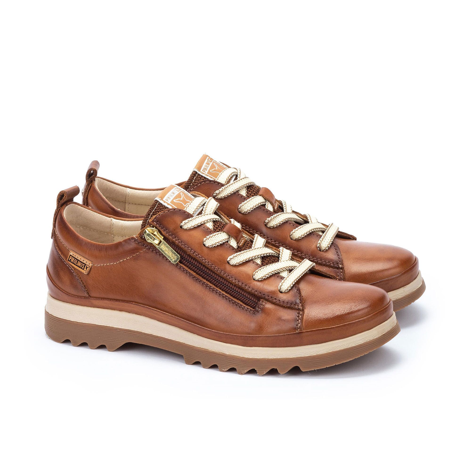 Pikolinos
Sneaker in pelle con
zip e Memory Foam