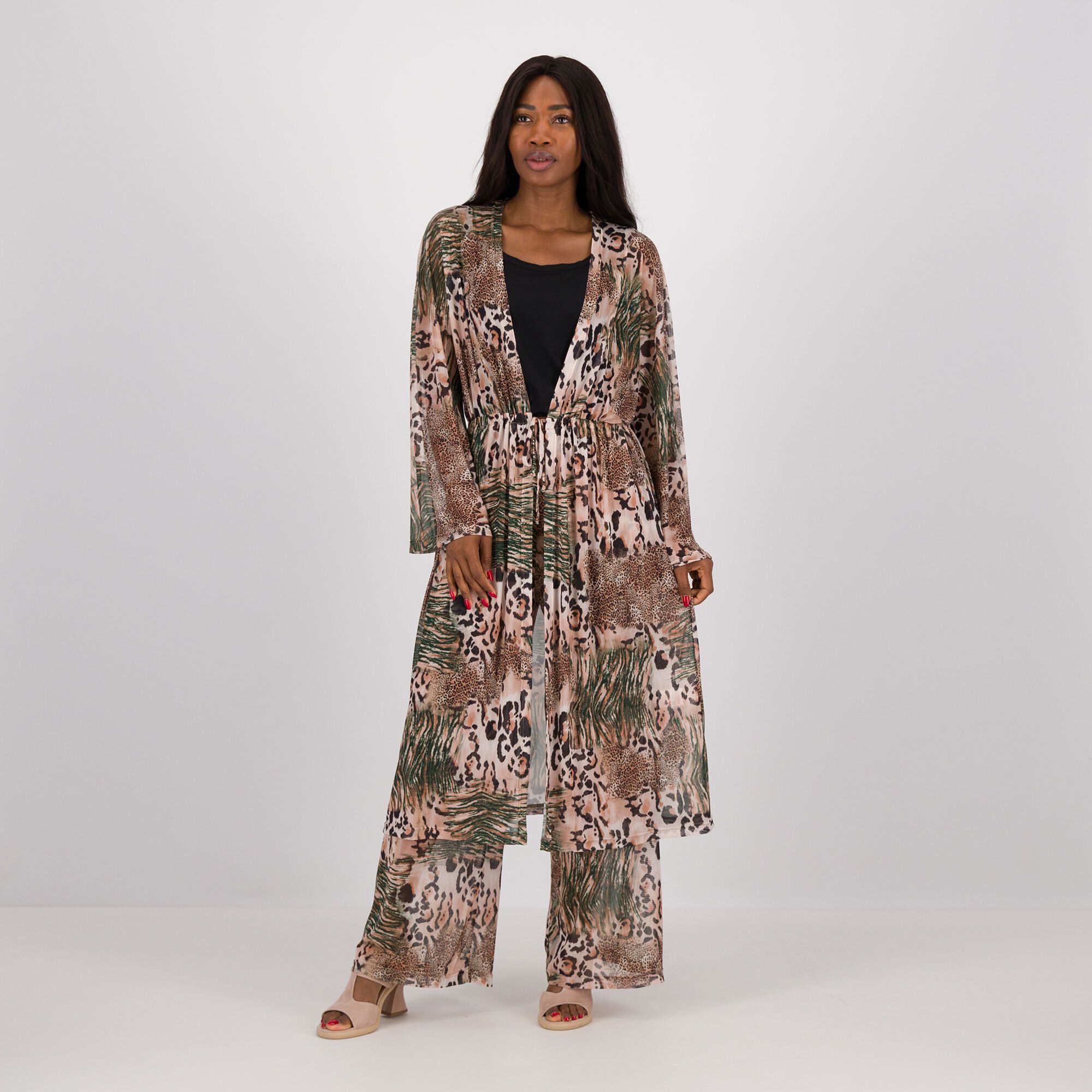 Officina della Moda
Spolverino in tulle
fantasia e manica
lunga