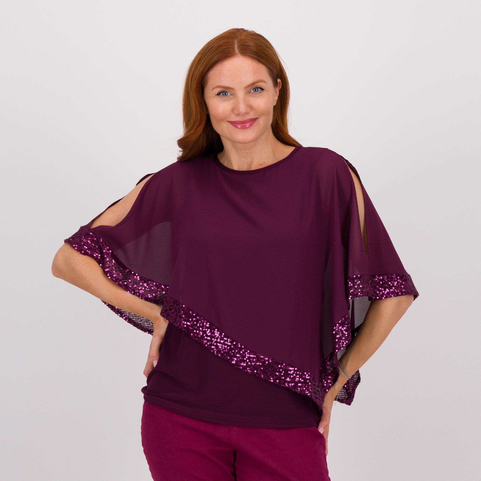 Nina Leonard
Blusa con paillettes