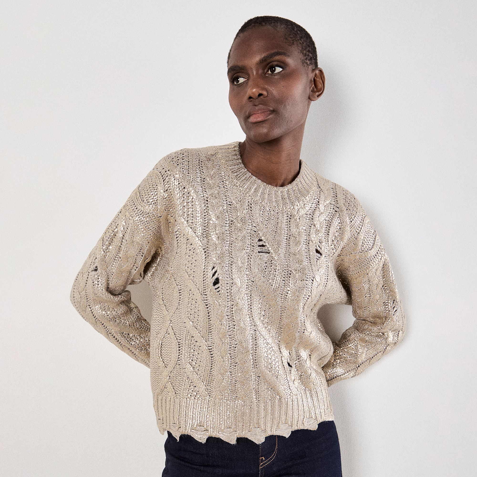 Apricot
Maglione a trecce
con lana