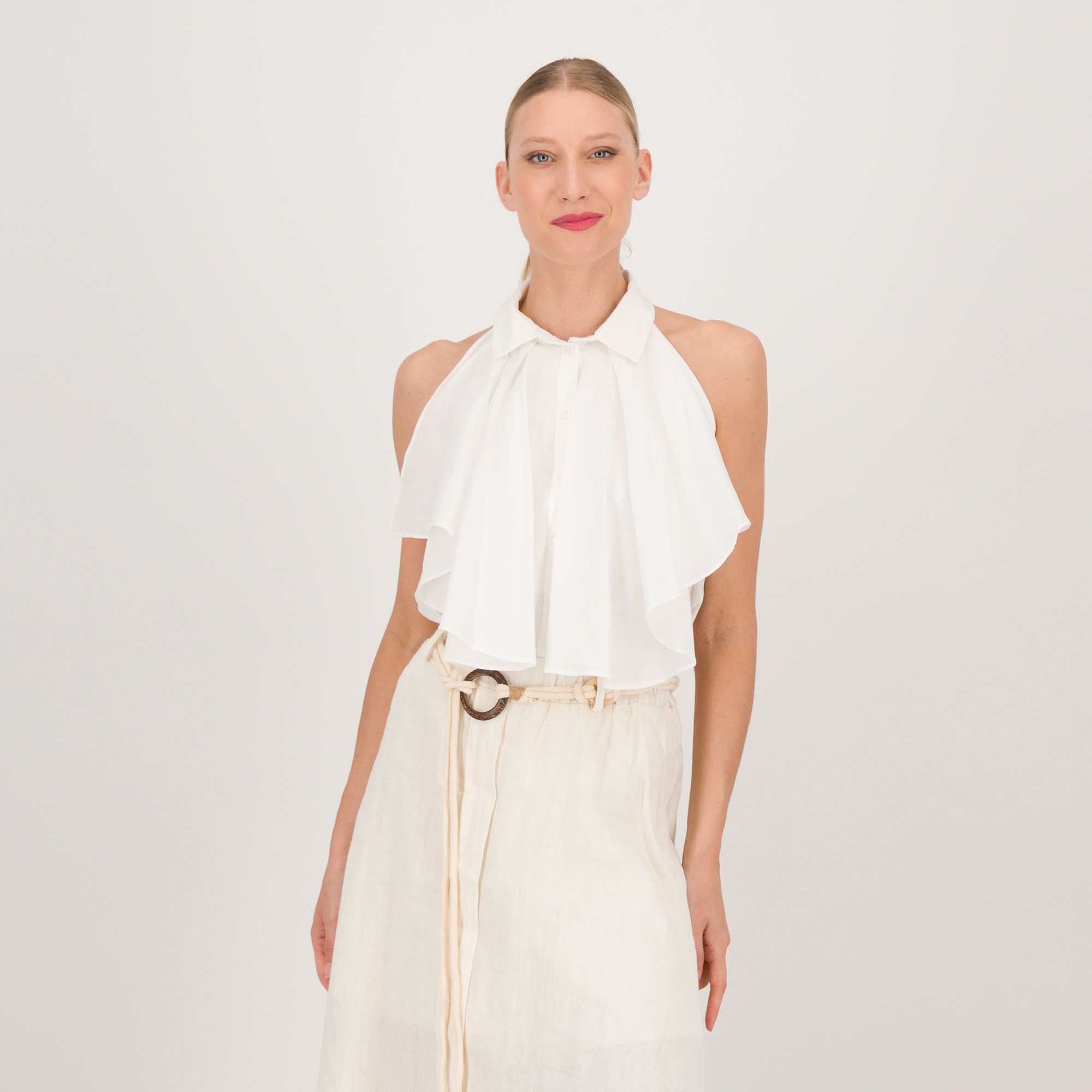 Risskio
Camicia smanicata
in cotone con scollo
all'americana