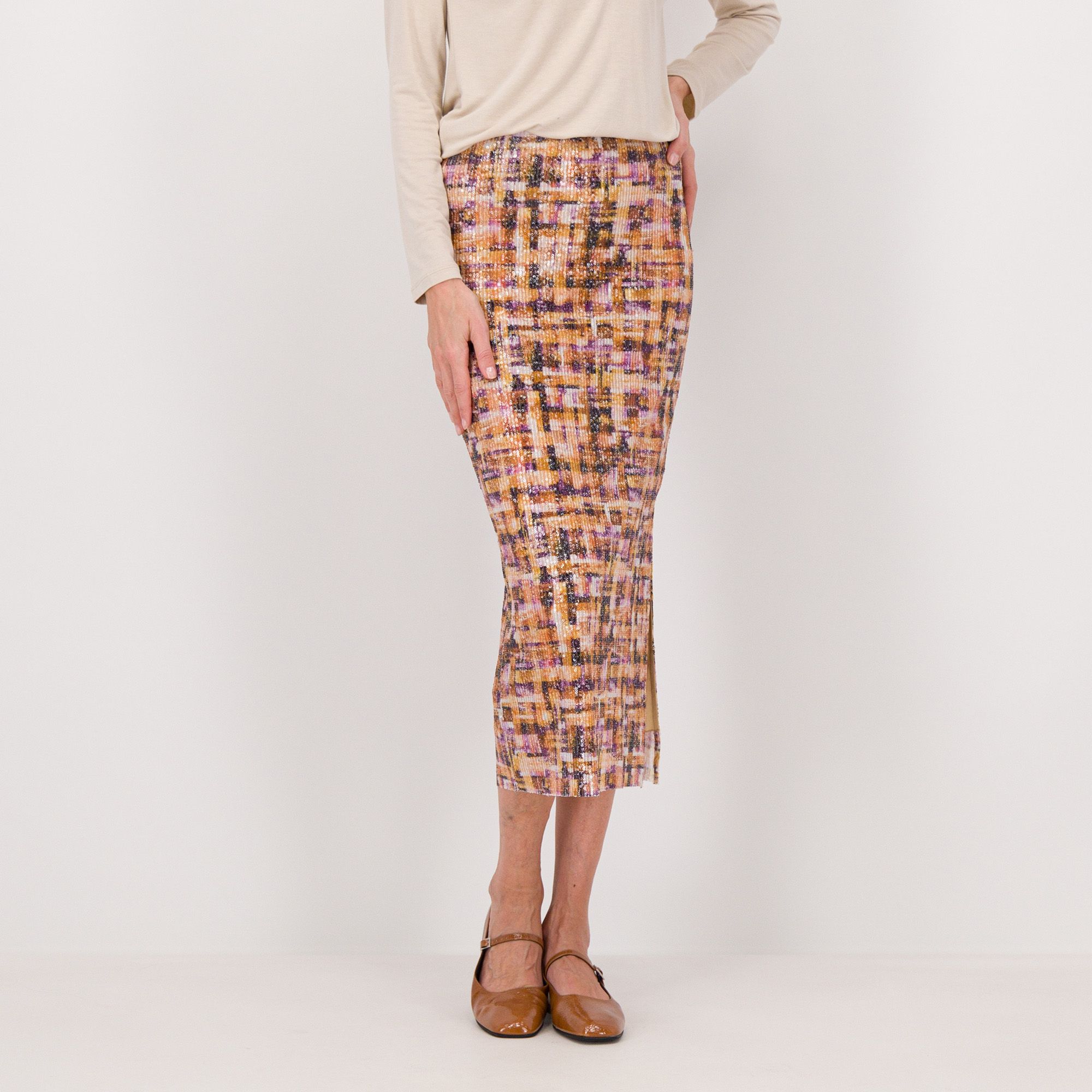 Caterina Lancini
Gonna a tubino
in tessuto a maglia
con paillettes