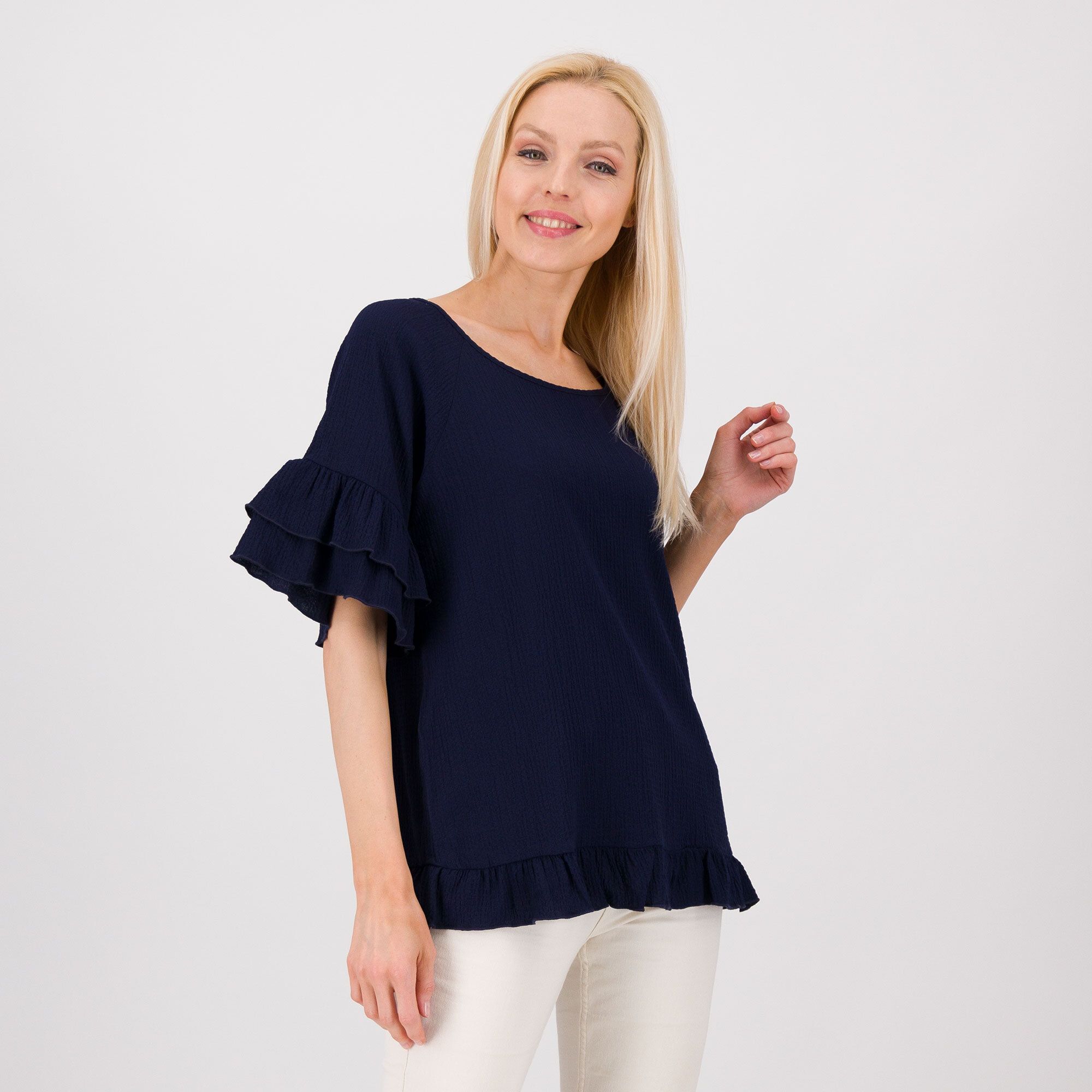 Nina Leonard
Maglia con
manica corta
e volants