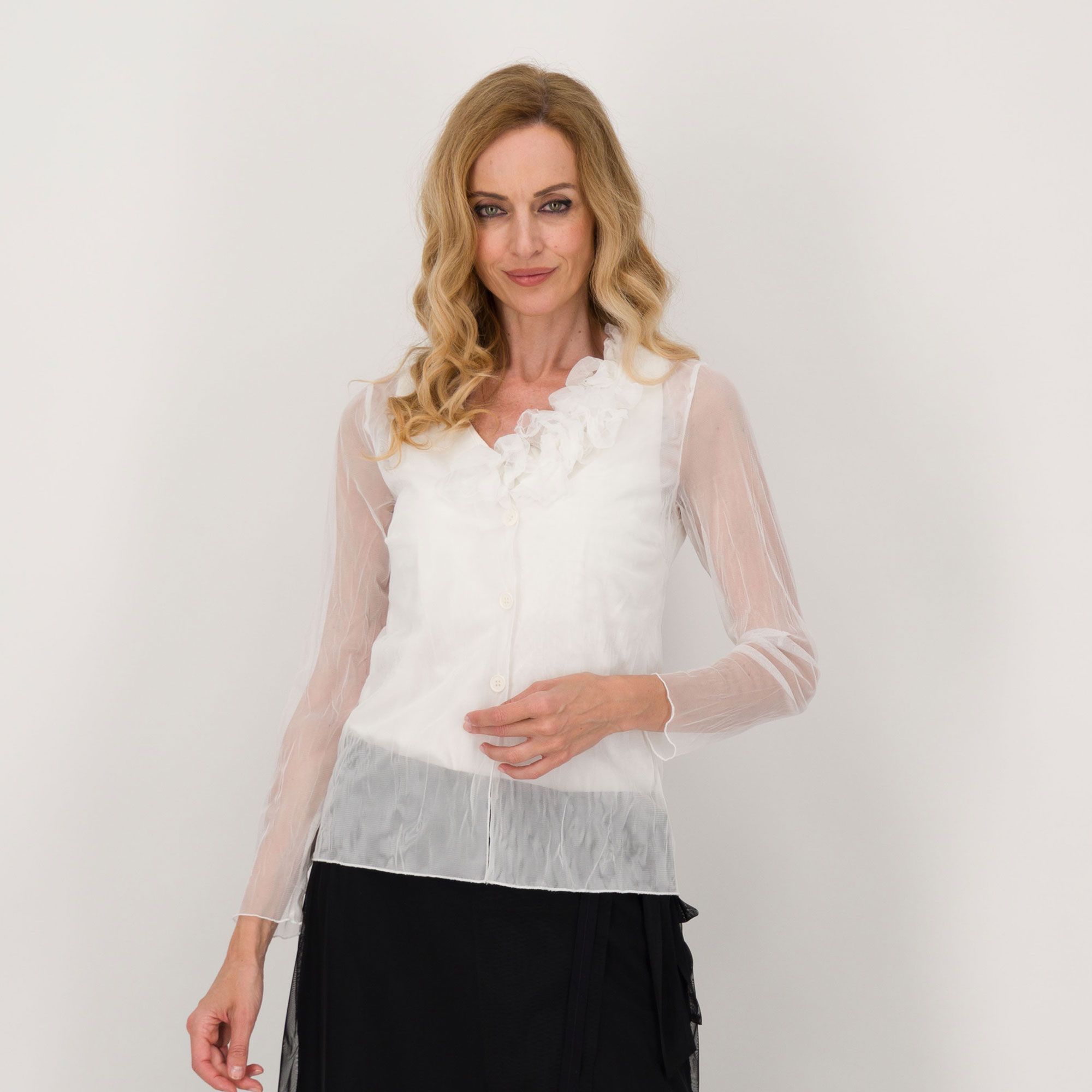 Caterina Lancini
Twinset:
canotta in jersey
e cardigan in tulle