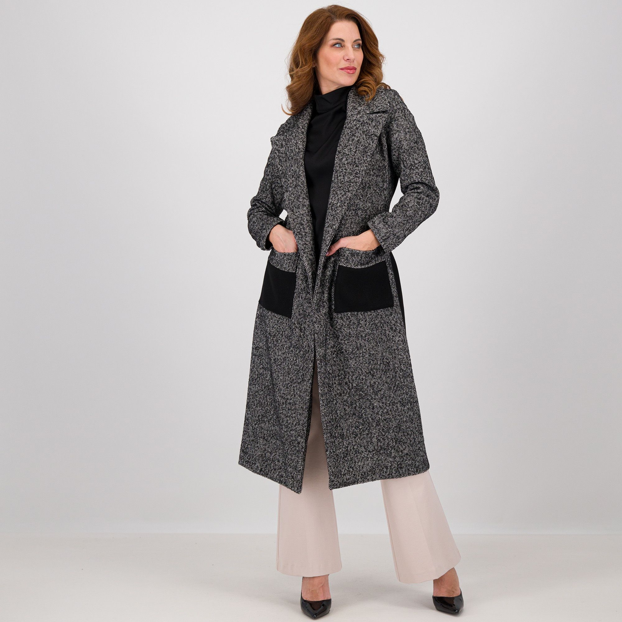 SottoMarino
Cappotto in tessuto
lavorato effetto sale
e pepe con tasche