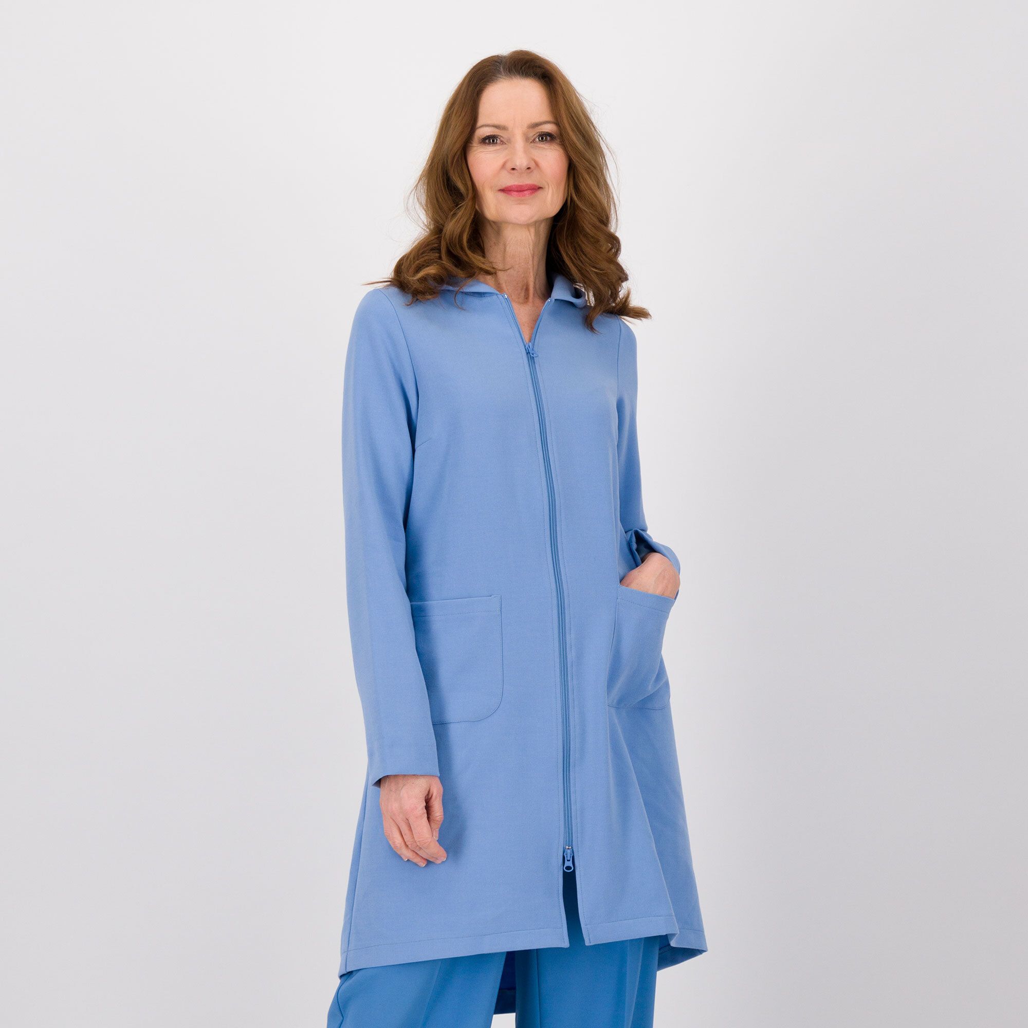 Caterina Lancini
Soprabito in
triplo crêpe
con cappuccio