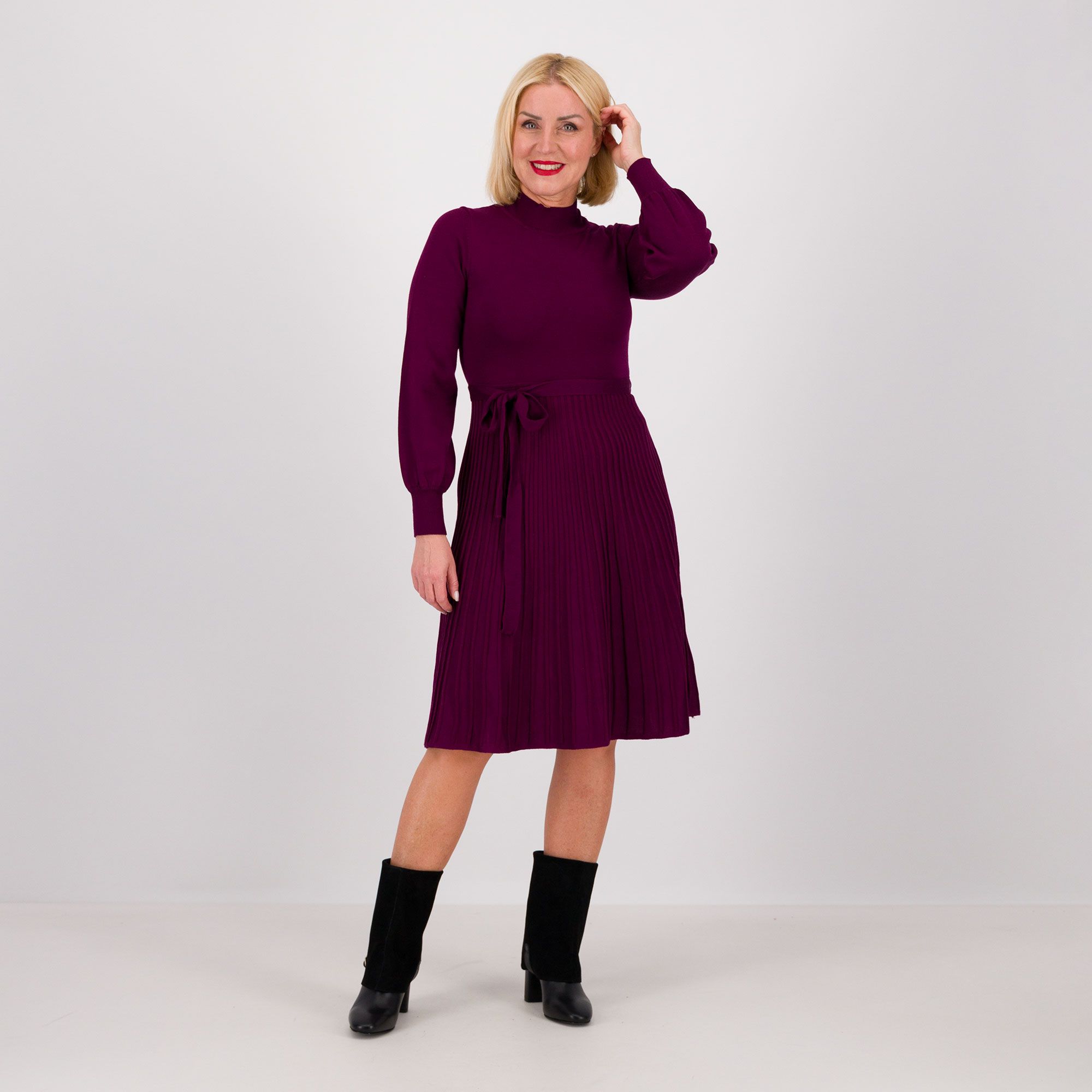 Nina Leonard
Abito in maglia
con maniche balloon
e collo a lupetto
