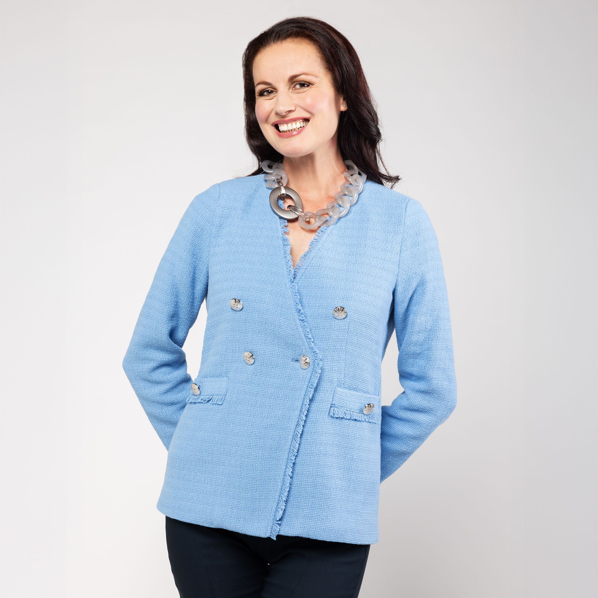 Officina della Moda
Giacca in tessuto
bouclé con tasche