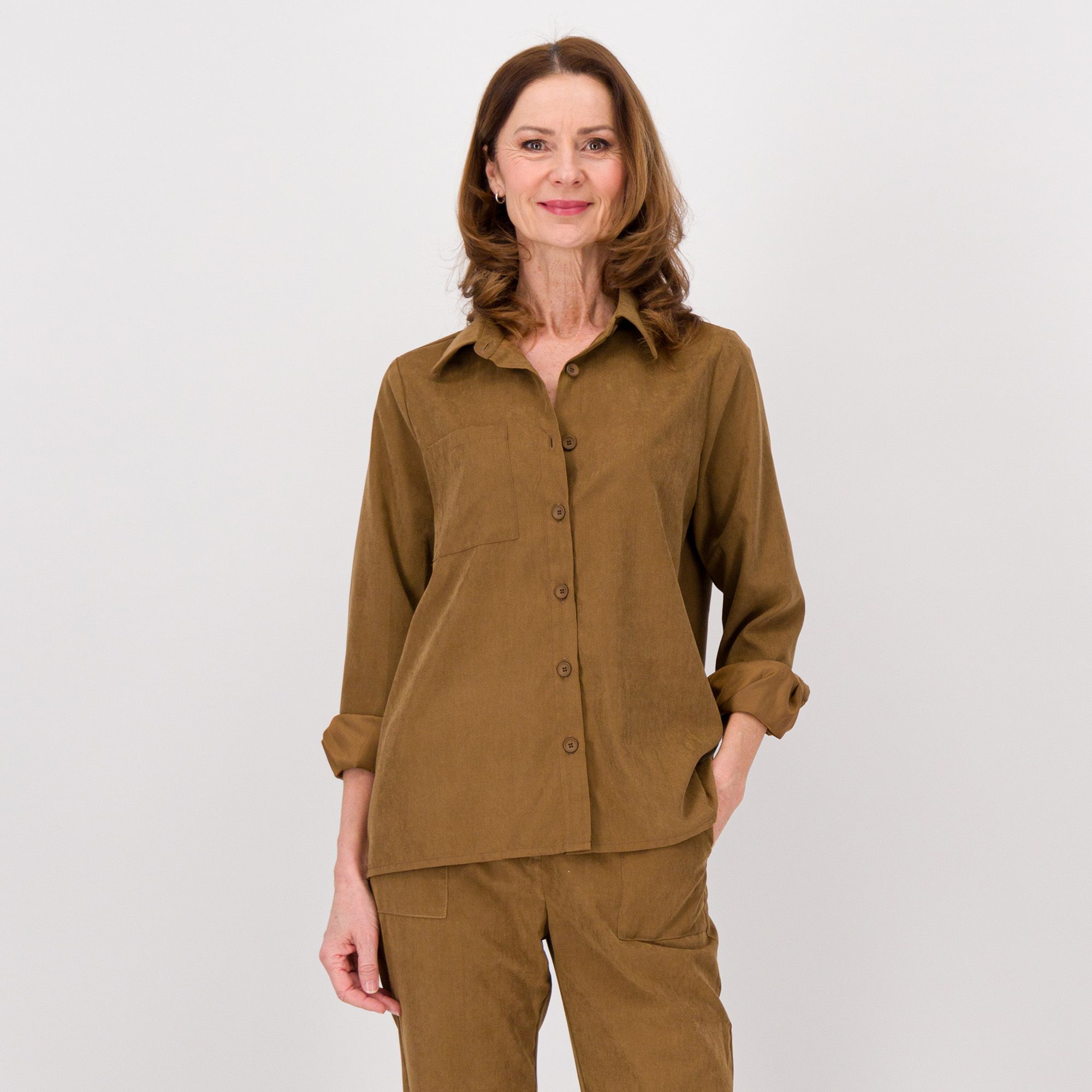 Officina della Moda
Camicione tessuto
mano pesca
con tasca grande