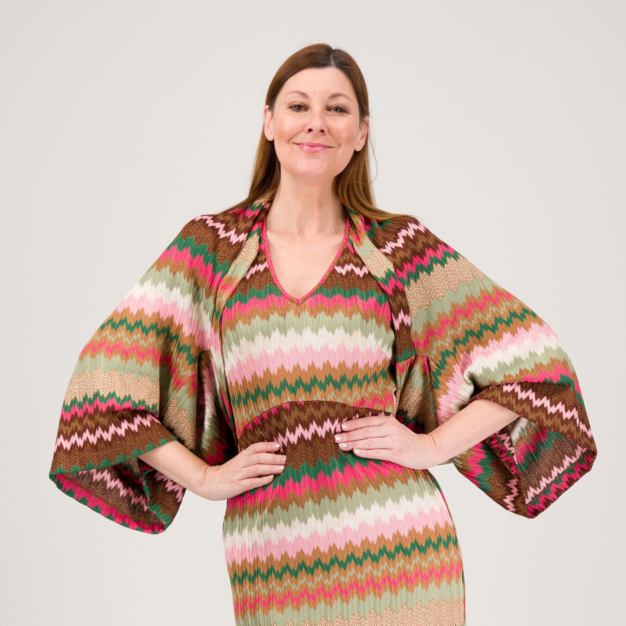 Extesa
Coprispalle in maglia
jacquard fantasia
con maniche 3/4