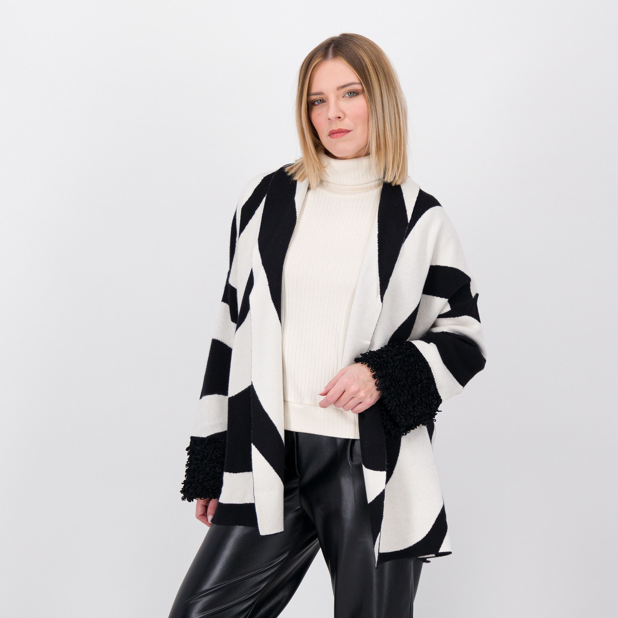 Wynne Layers
Cardigan aperto in
maglia jacquard con
manica lunga