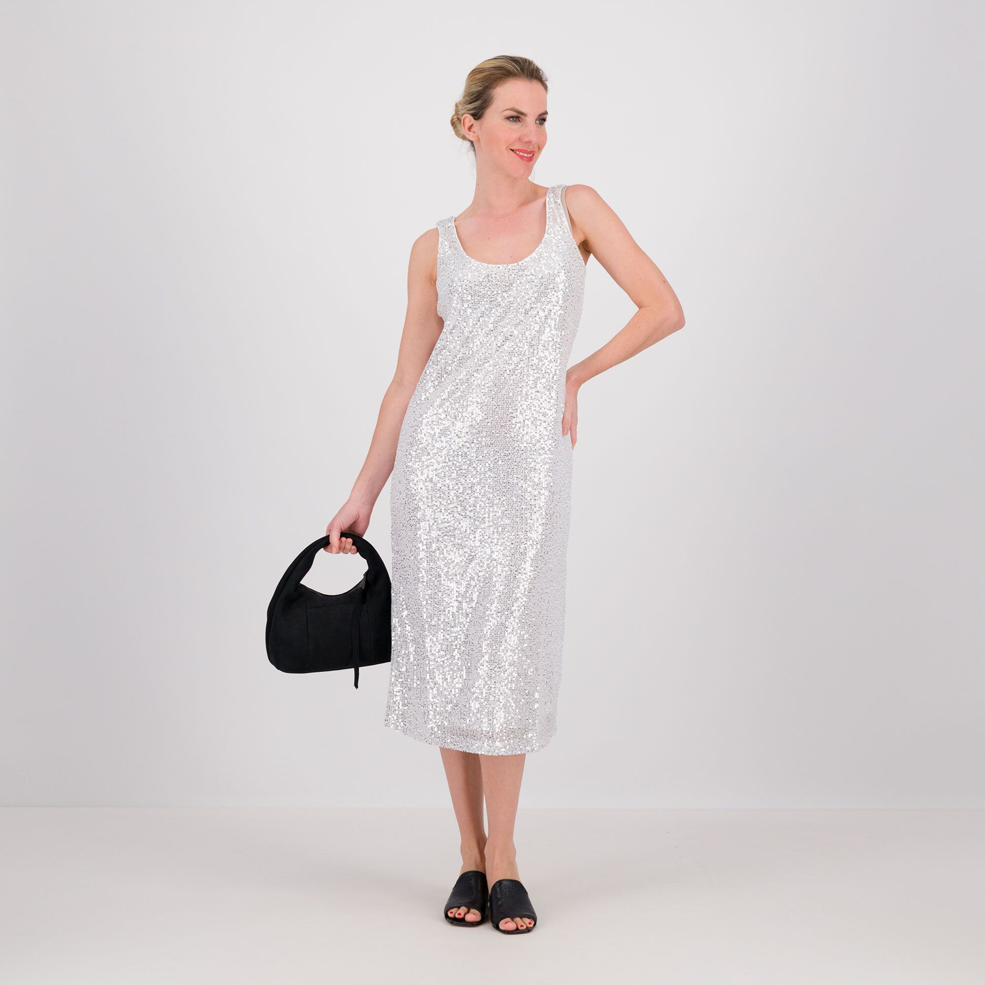 PARKER & ROWE
Abito longuette
in tulle con
paillette