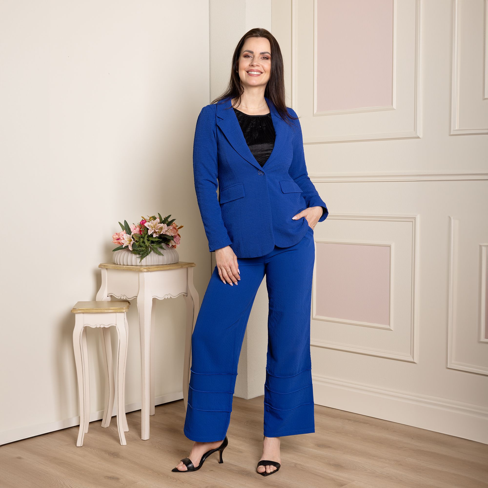 Nina Leonard
Blazer a un bottone
con spacco dietro