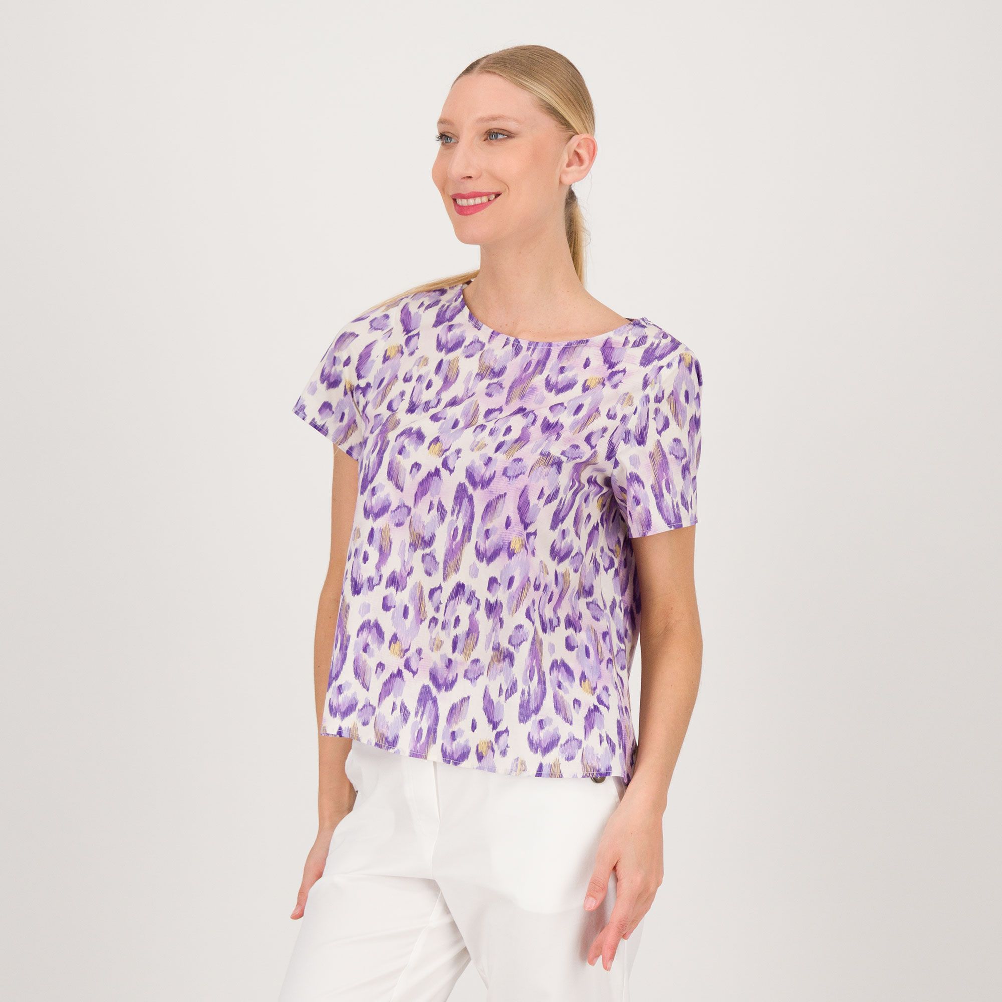 Extesa
Blusa fantasia
a maniche corte
in cotone