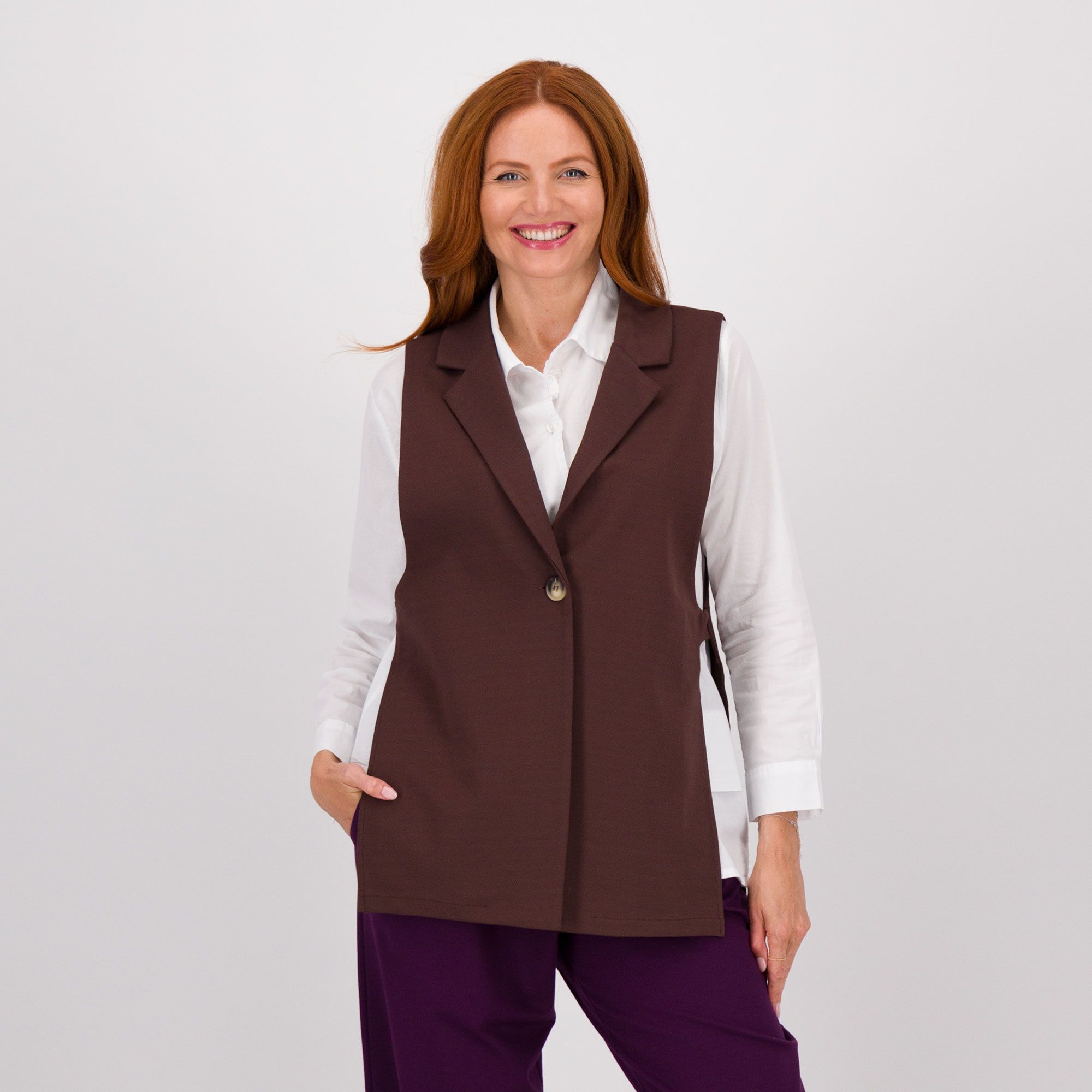 LUCREZIA SCIORTINO Gilet lungo in punto Milano con spacchi laterali