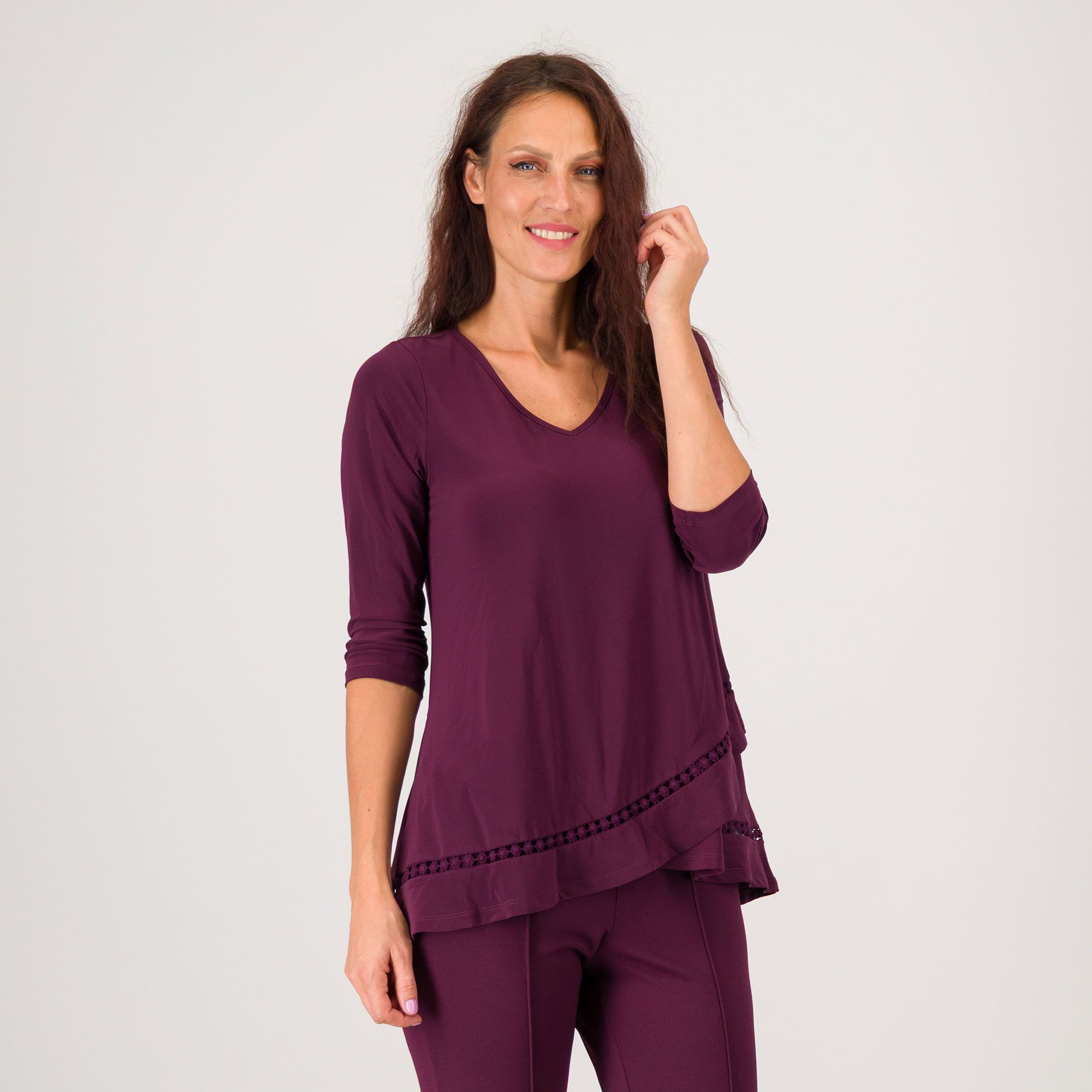 Nina Leonard
Blusa in jersey
stretch con scollo
a V