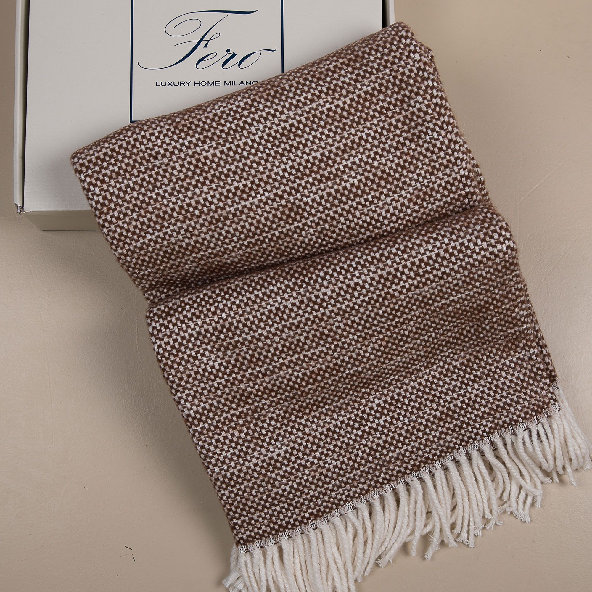 Ferò
Plaid Neve
con frange in
confezione regalo