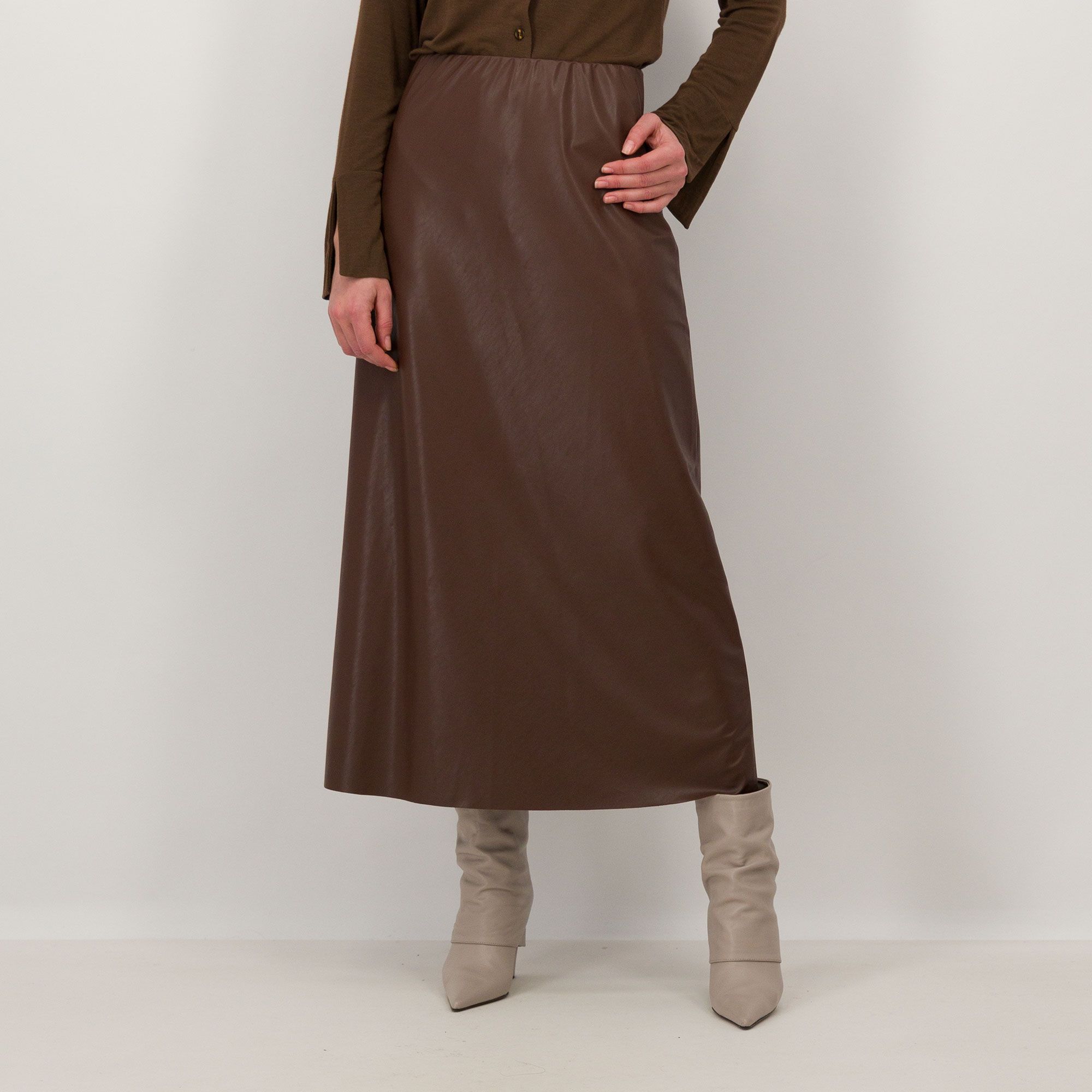 Caterina Lancini
Gonna in sbieco
in tessuto spalmato
con elastico in vita