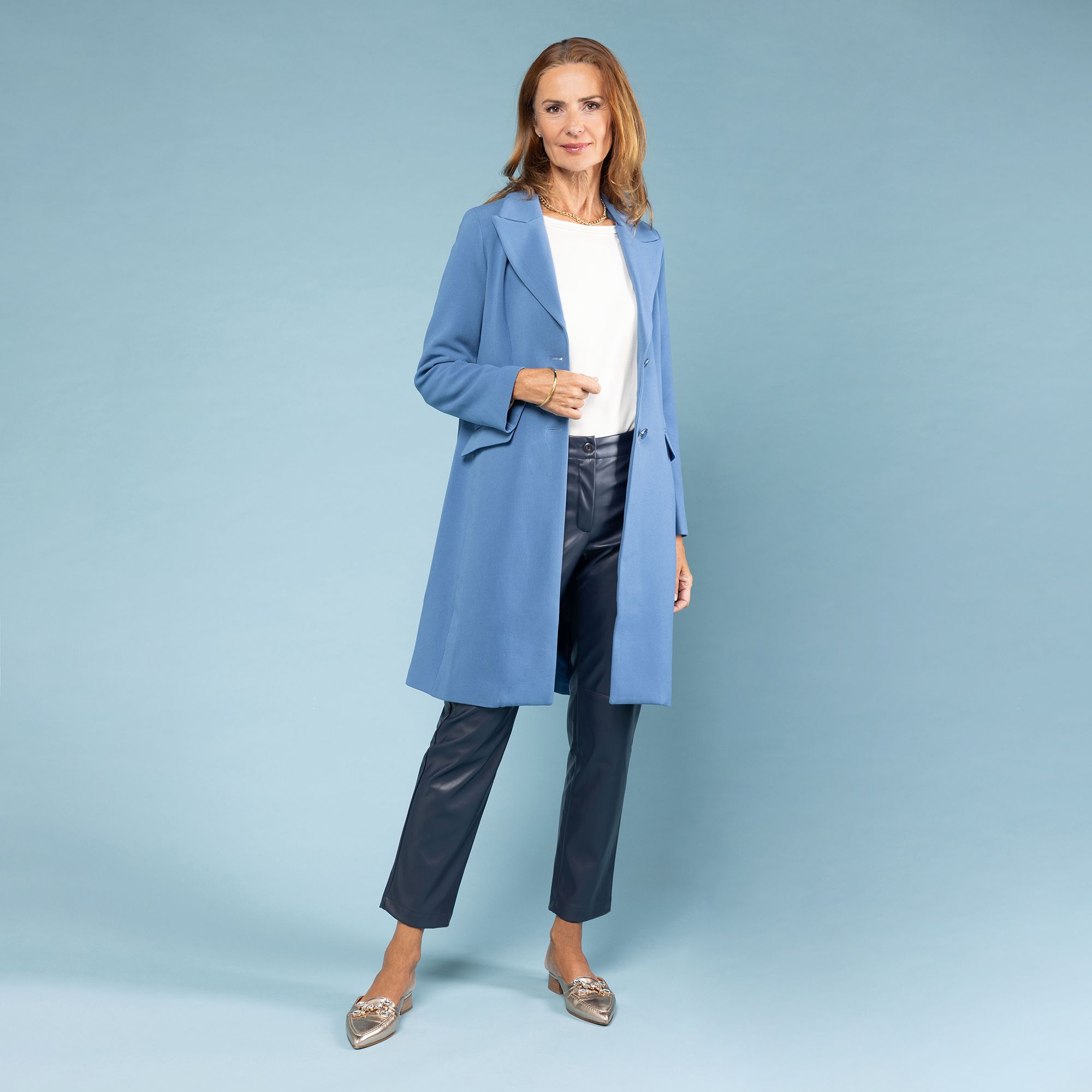 Officina della Moda
Cappotto foderato
a due bottoni