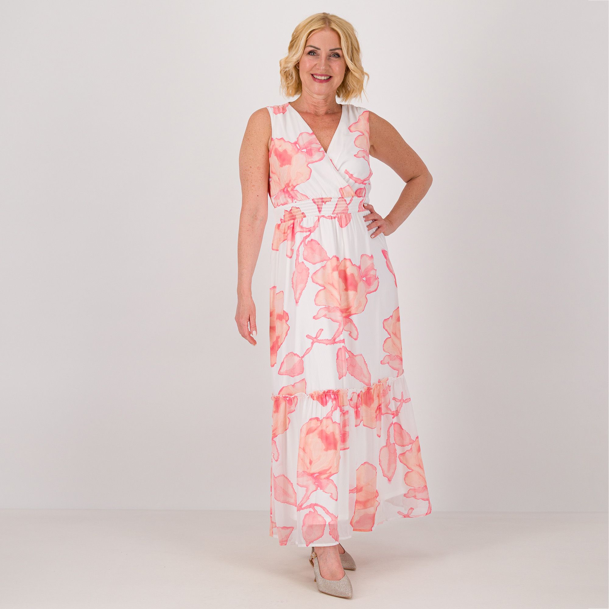 Nina Leonard
Abito lungo smanicato
in chiffon con scollo
a V e balza