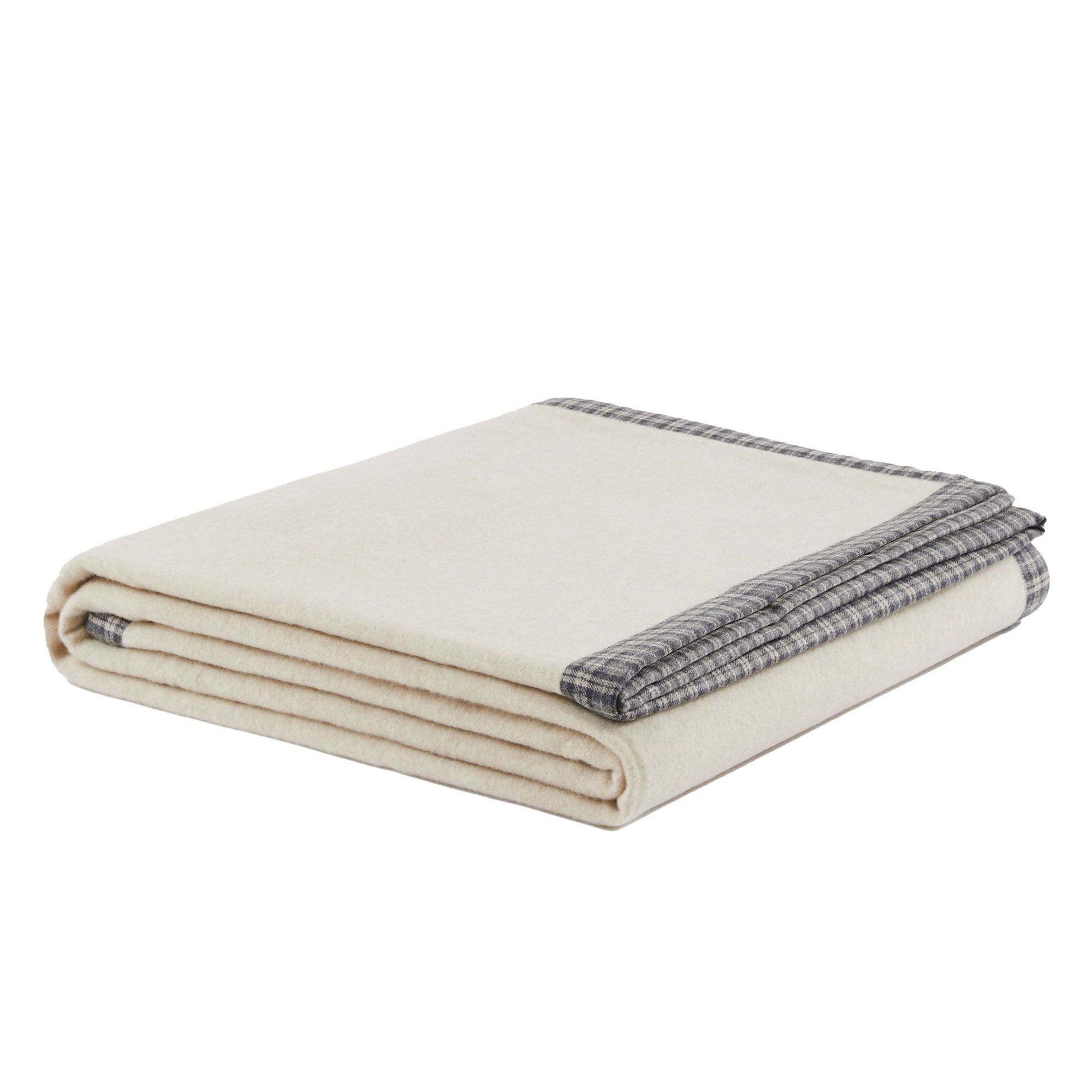 Marzotto Home
Coperta Stella
in lana e cashmere
con bordo scozzese