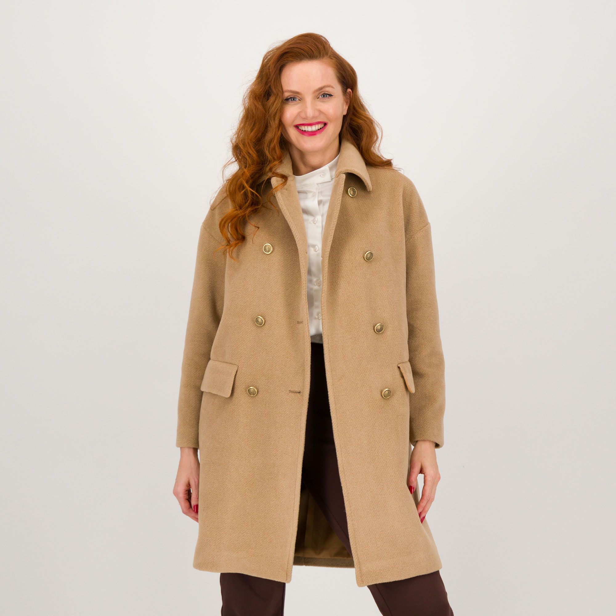 Caterina Lancini
Cappottino
doppiopetto
in panno