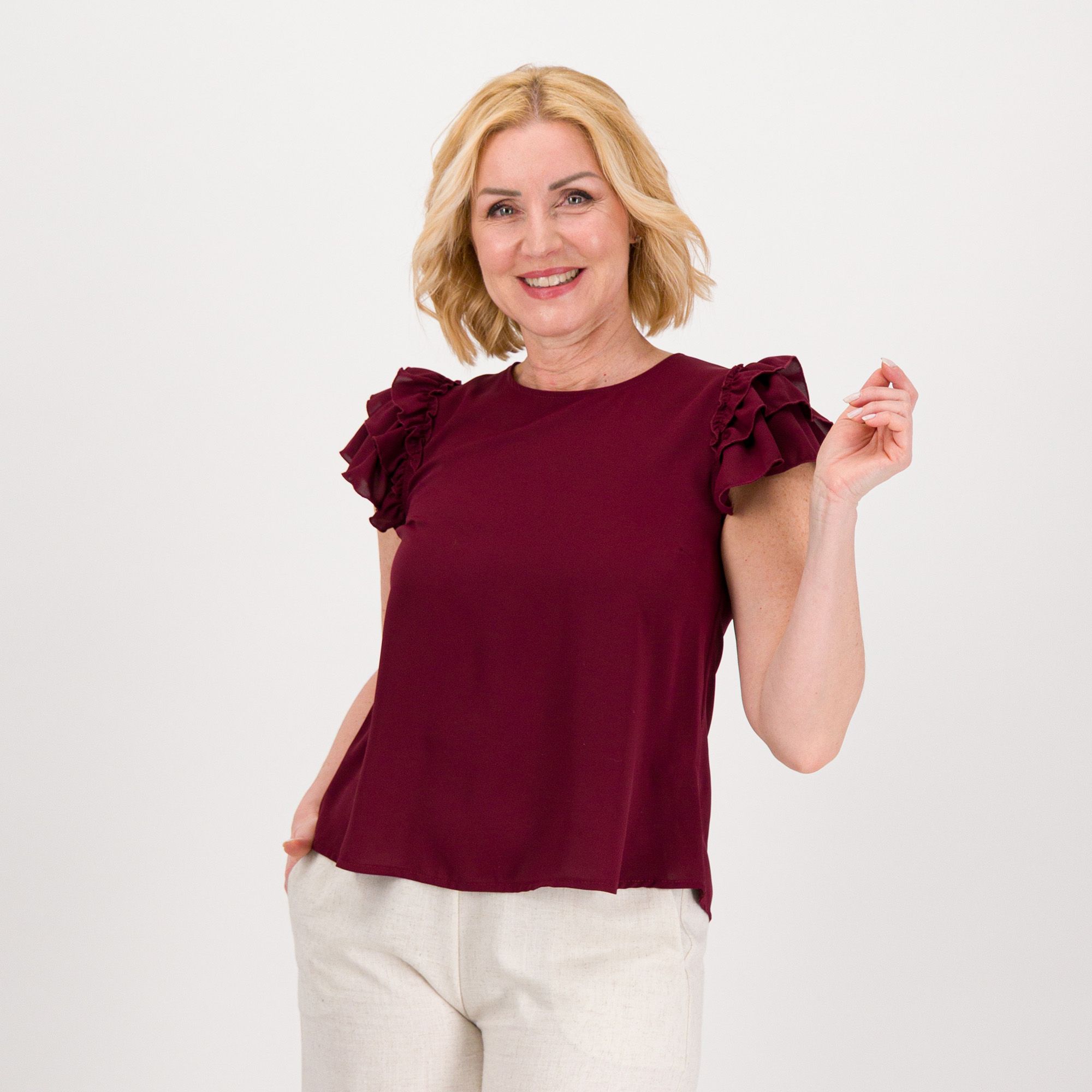 SottoMarino
Top in raso opaco
con maniche corte
con rouches