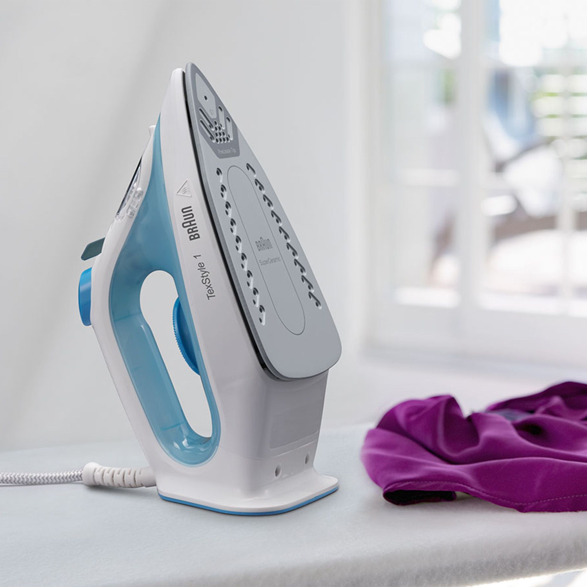 Braun
Ferro da stiro a
vapore TexStyle 1 con
piastra Superceramic