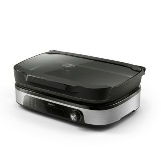 Philips HD6212/90
Grill da tavolo
con coperchio e
affumicatore