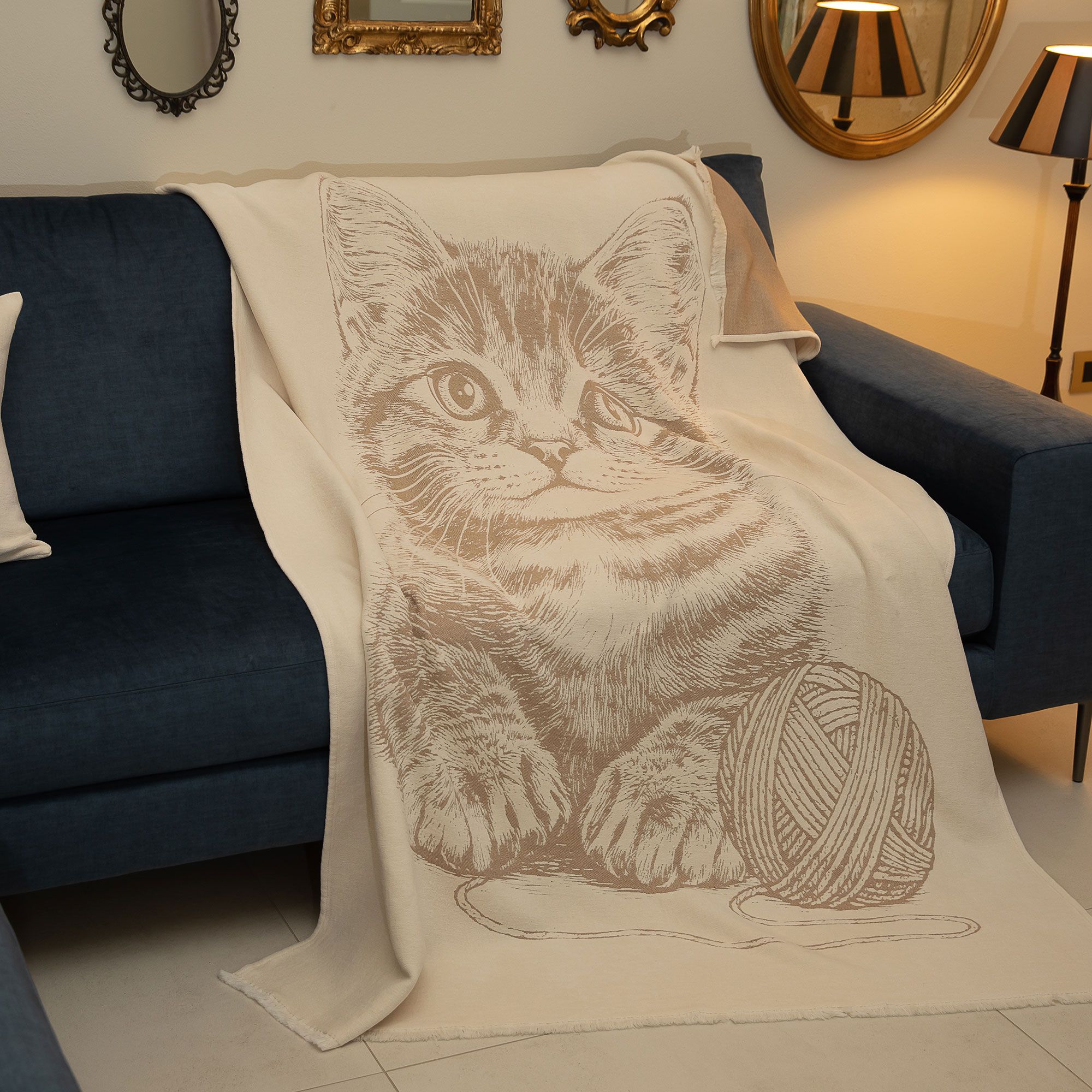 Ferò
Plaid in cotone
con disegno
animali