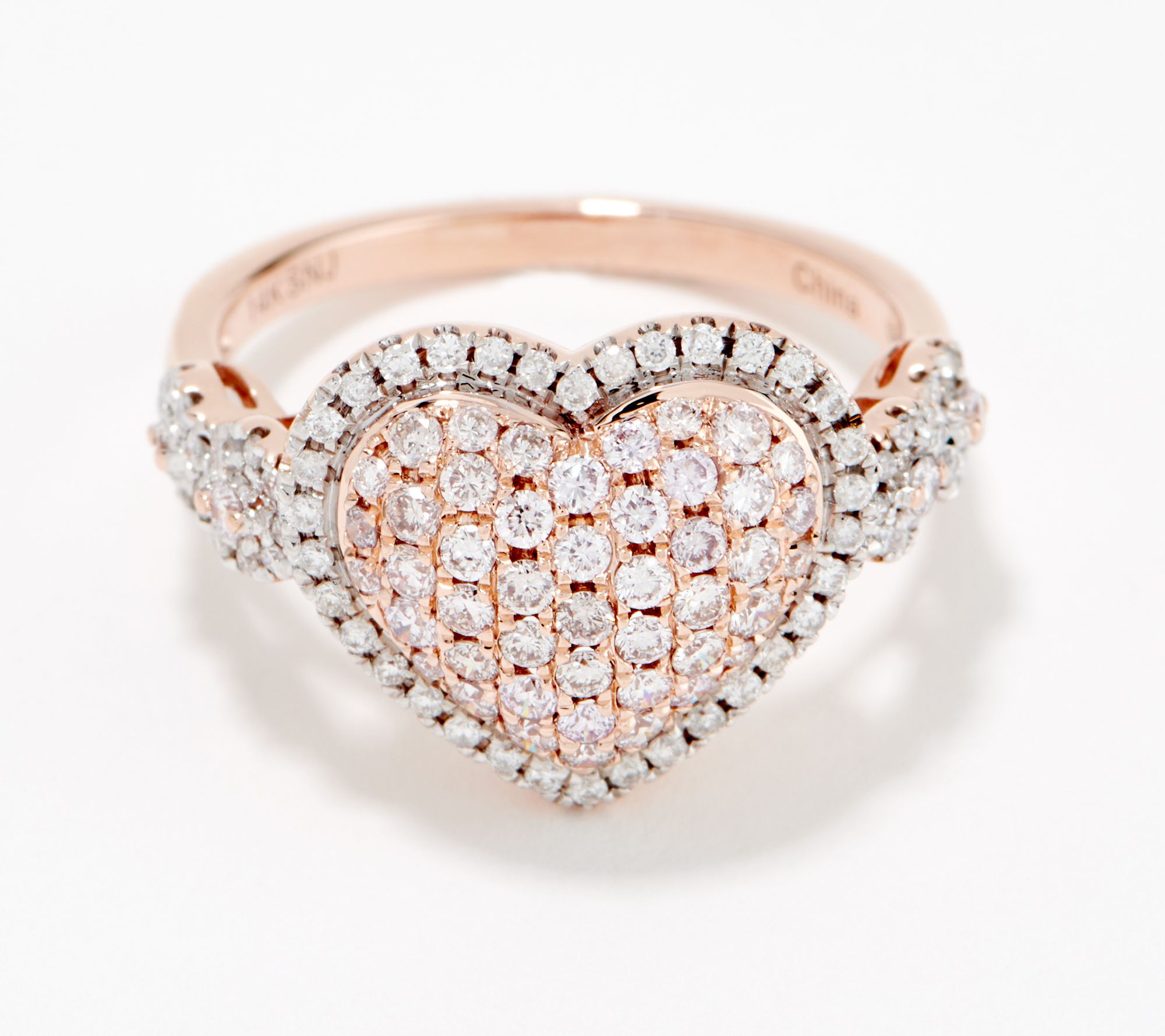Pink gold engagement ring with heart-shaped diamond